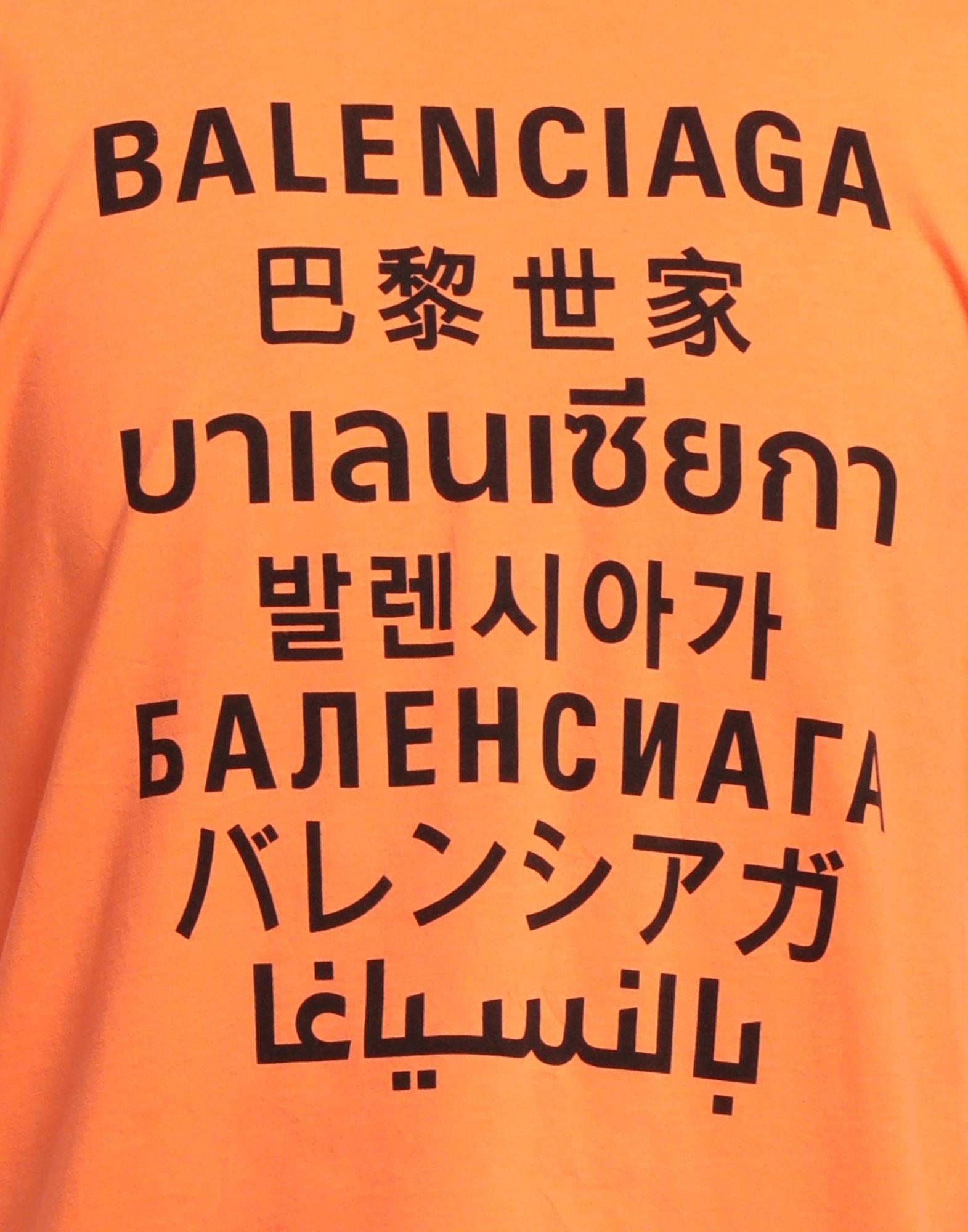 Balenciaga Balenciaga multi language orange t shirt  Grailed