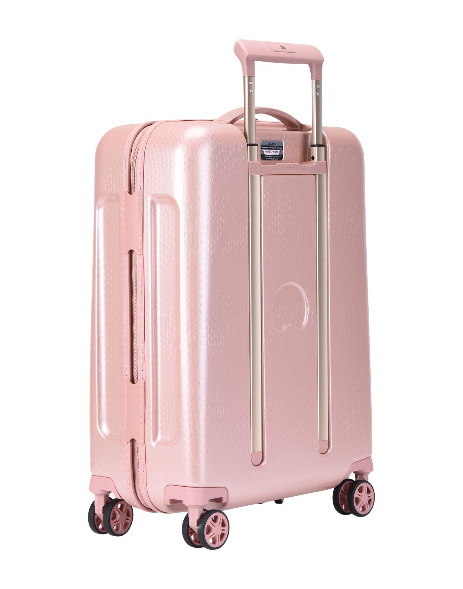 pastel pink suitcase