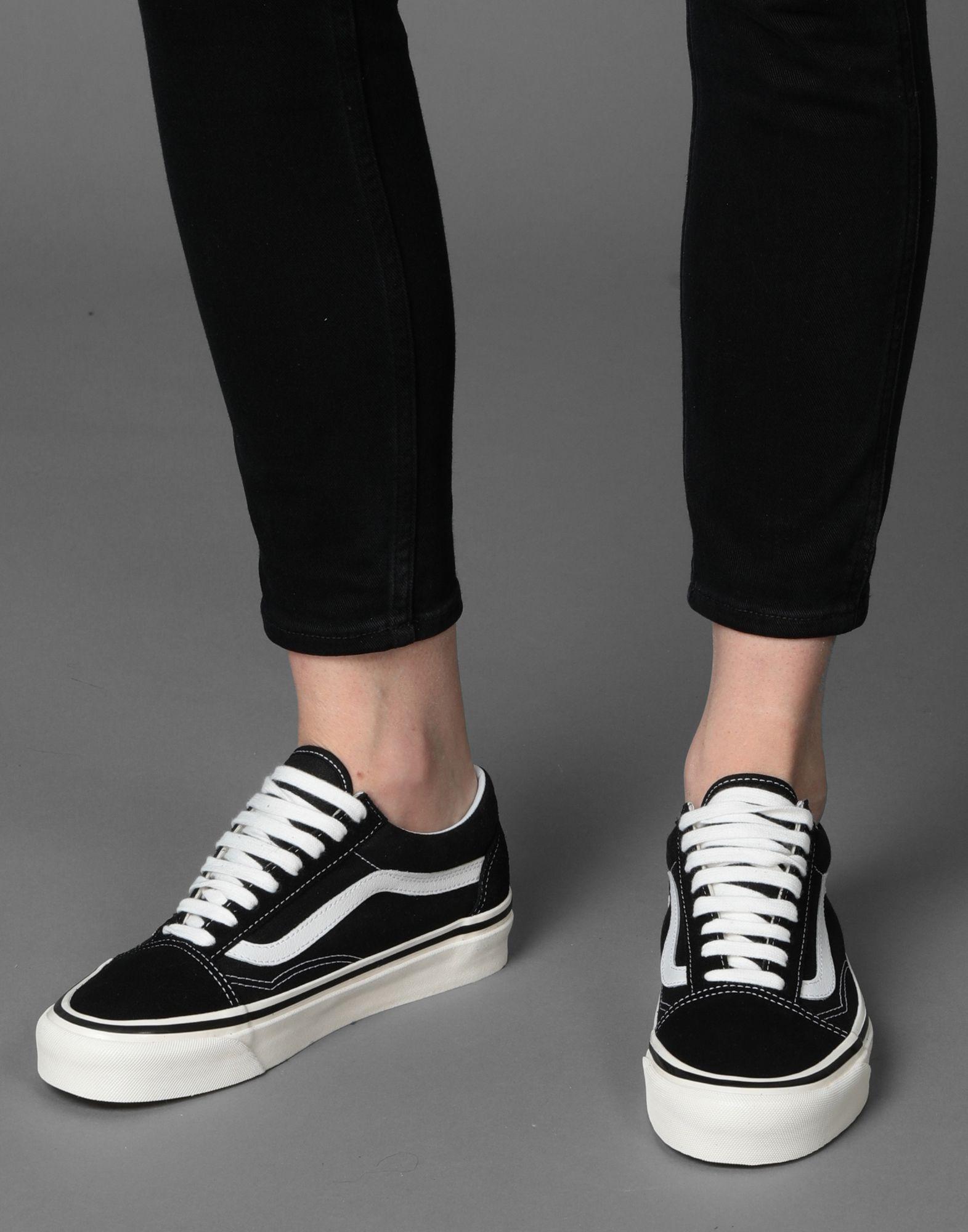 vans black low top