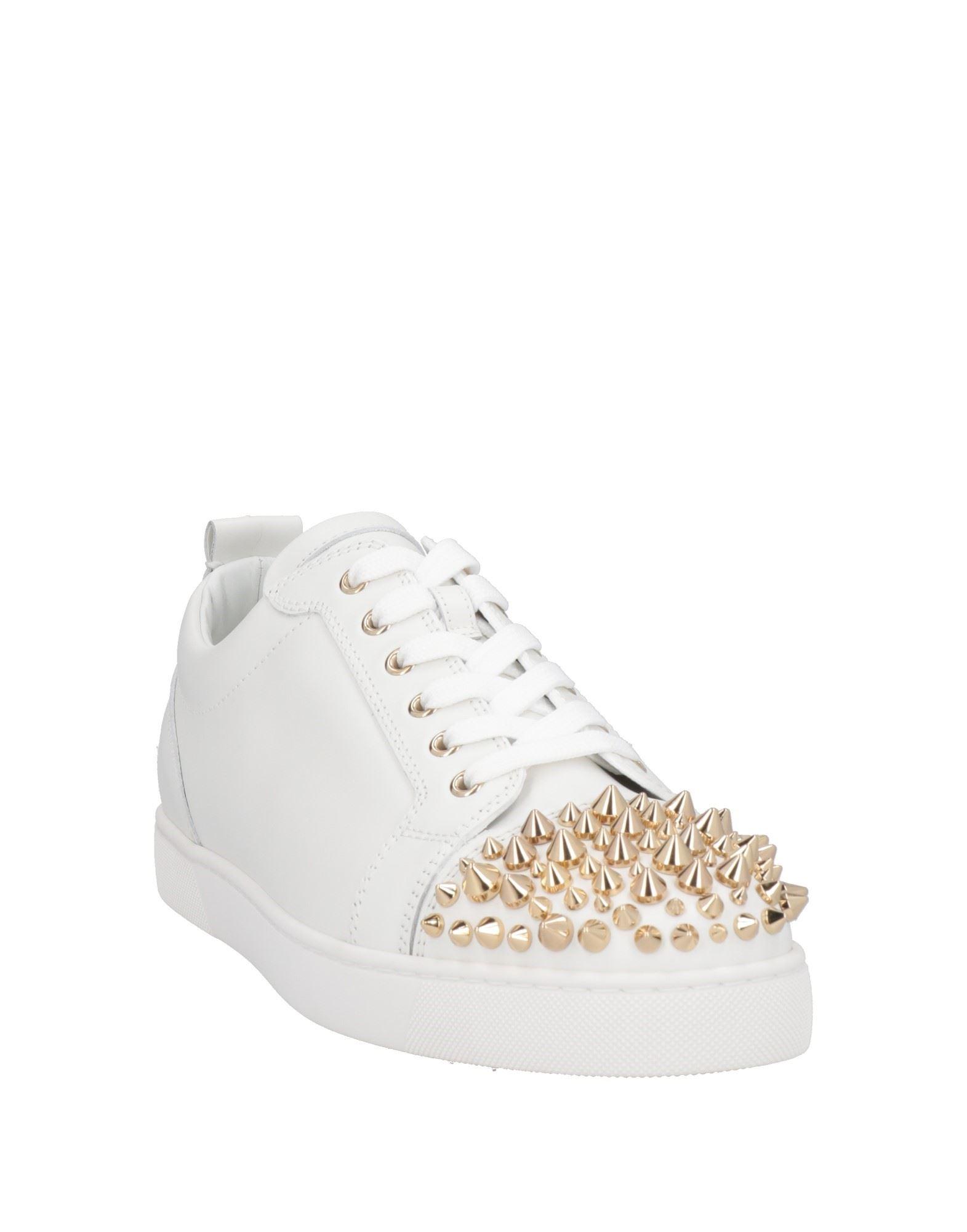 White and top gold louboutin sneakers