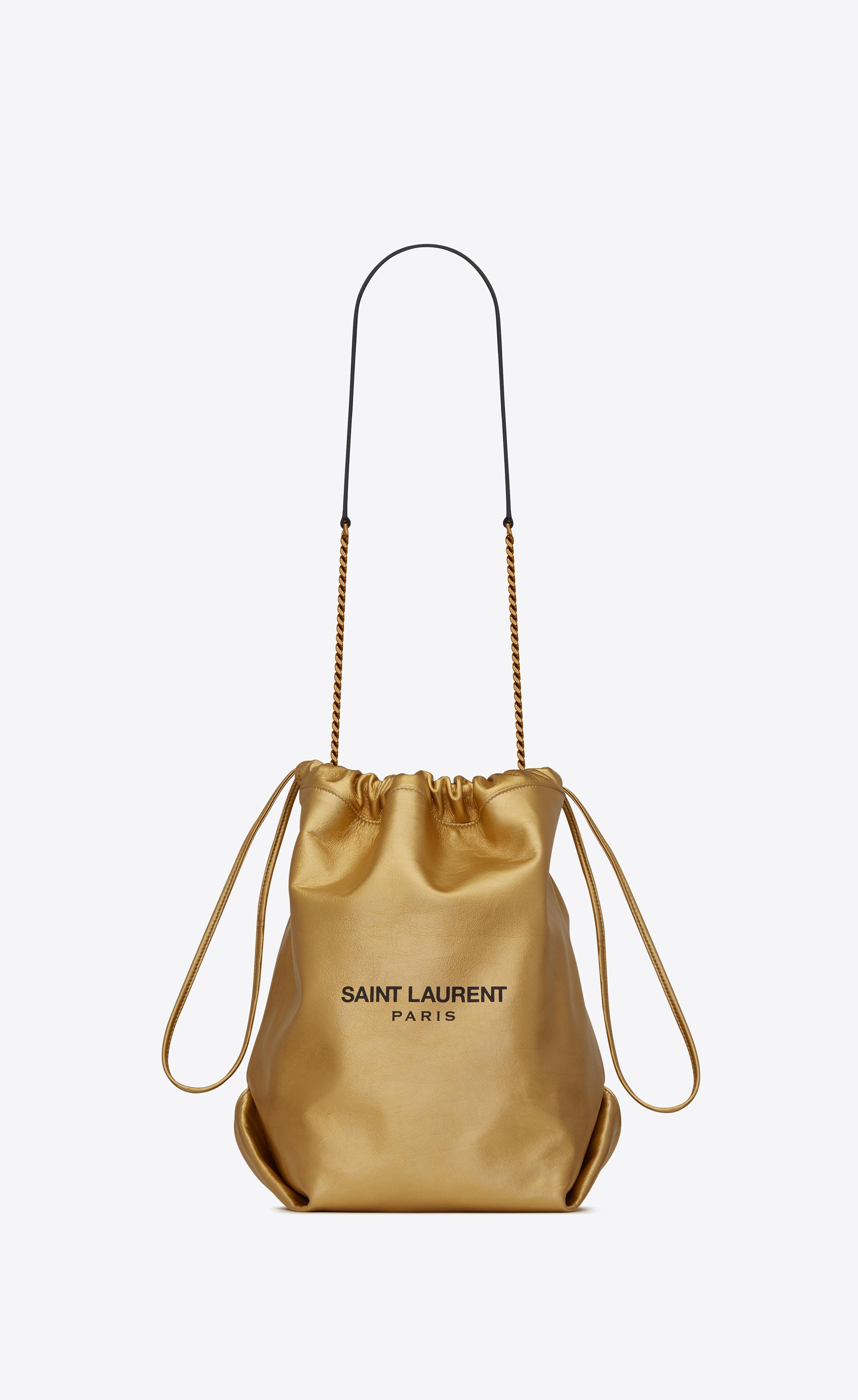 Saint Laurent Leather Teddy Bucket Bag In Gold Metallic Lyst