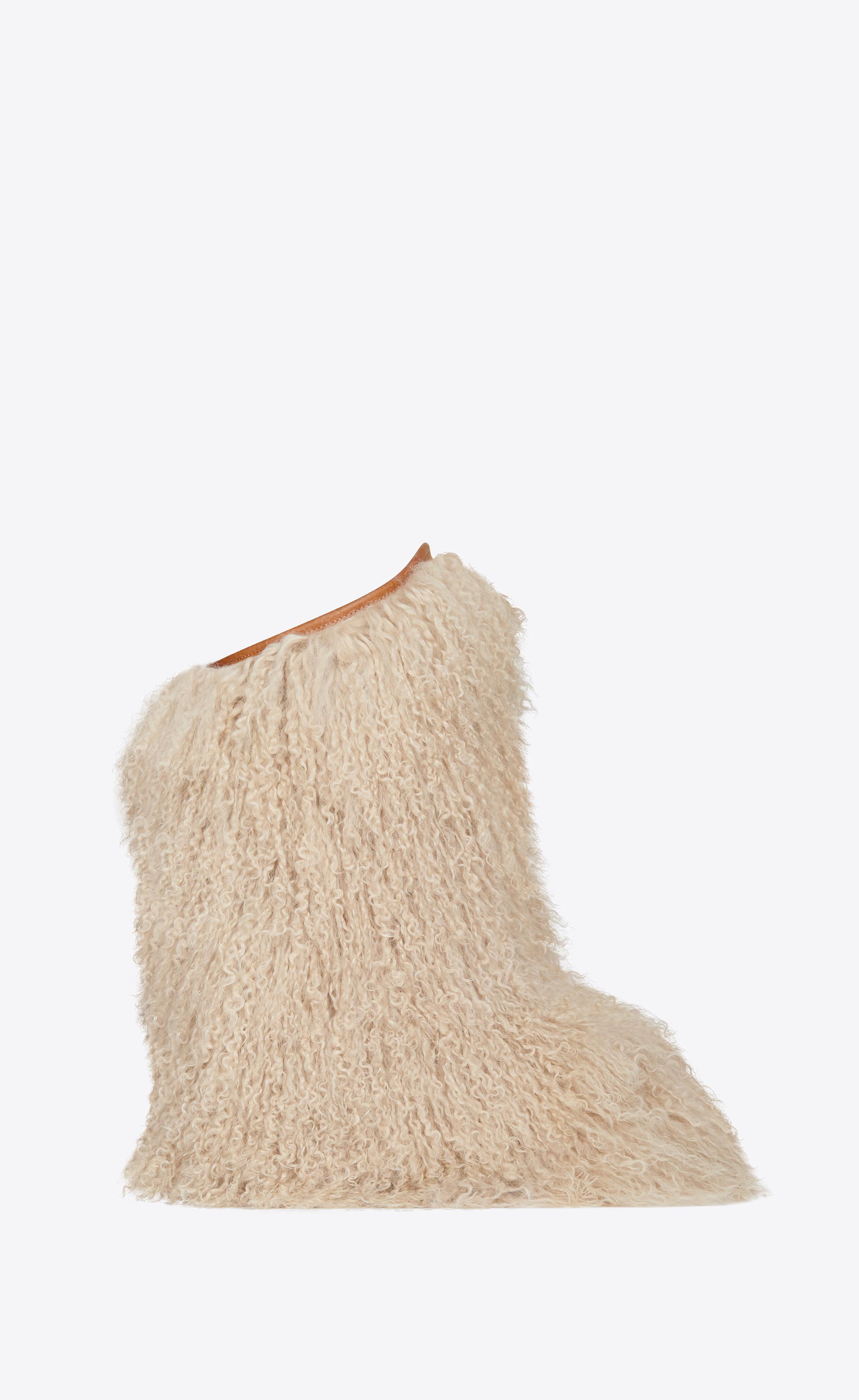 Saint laurent hot sale furry boots