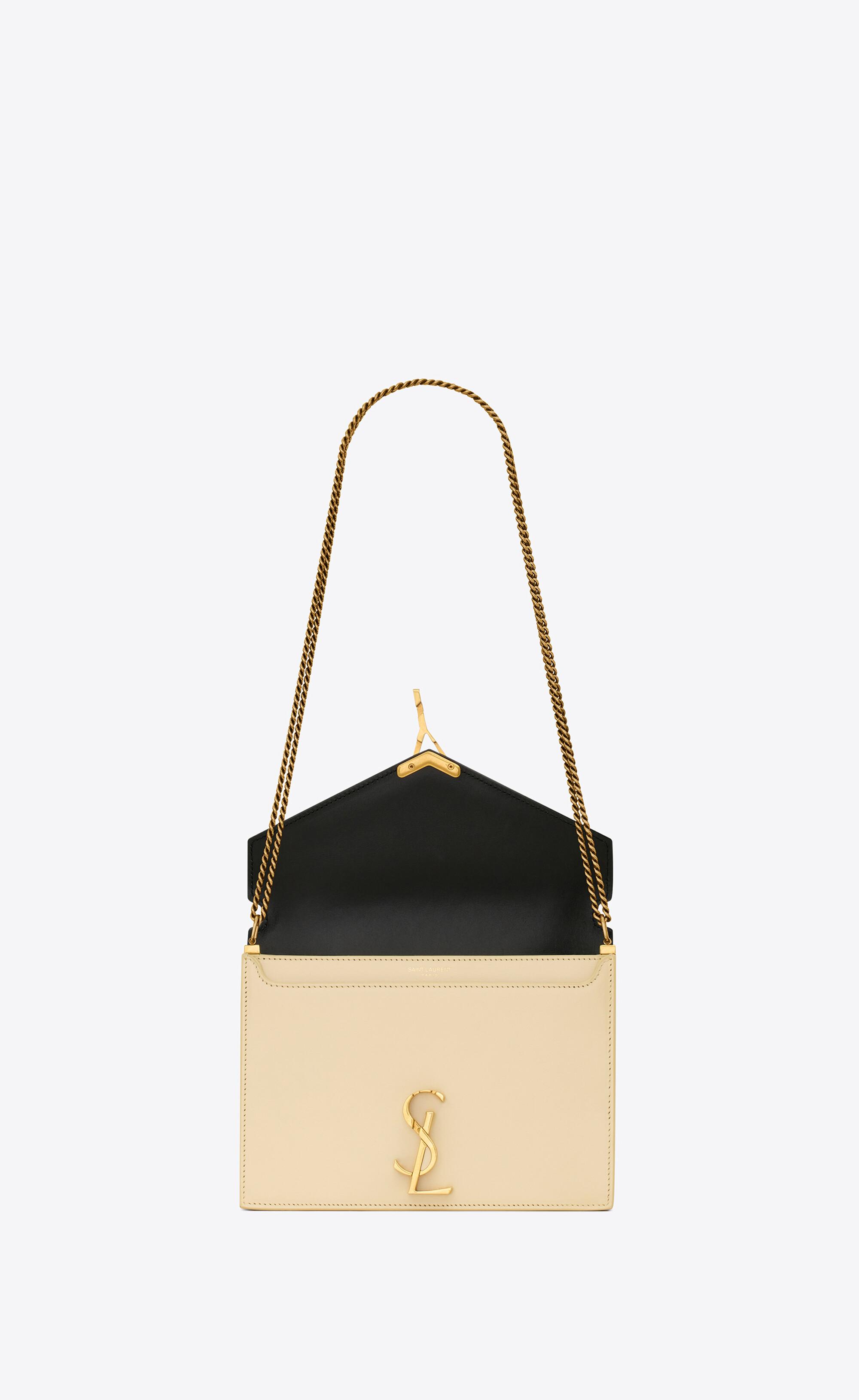 CASSANDRA Mini top handle bag in BOX SAINT LAURENT leather