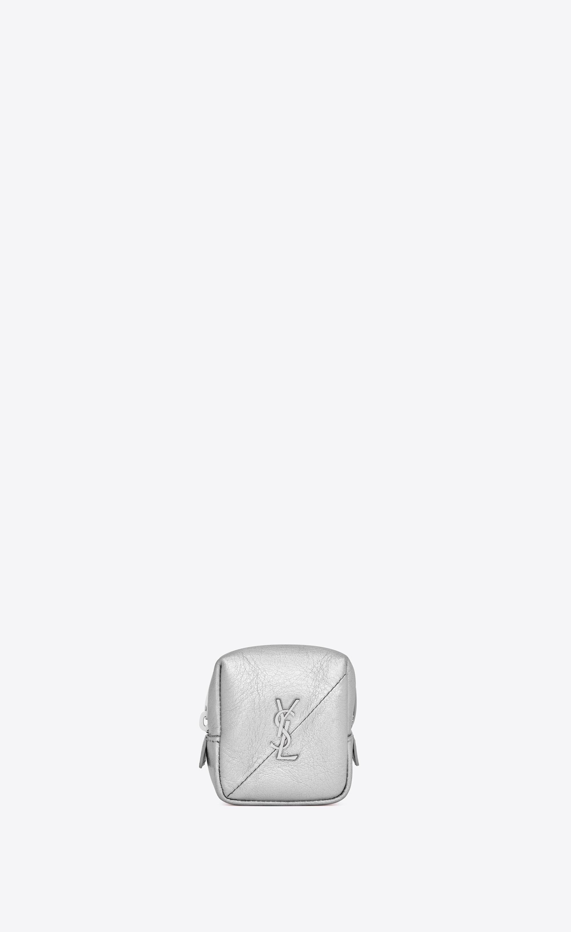 niki quilted leather zip pouch at $495