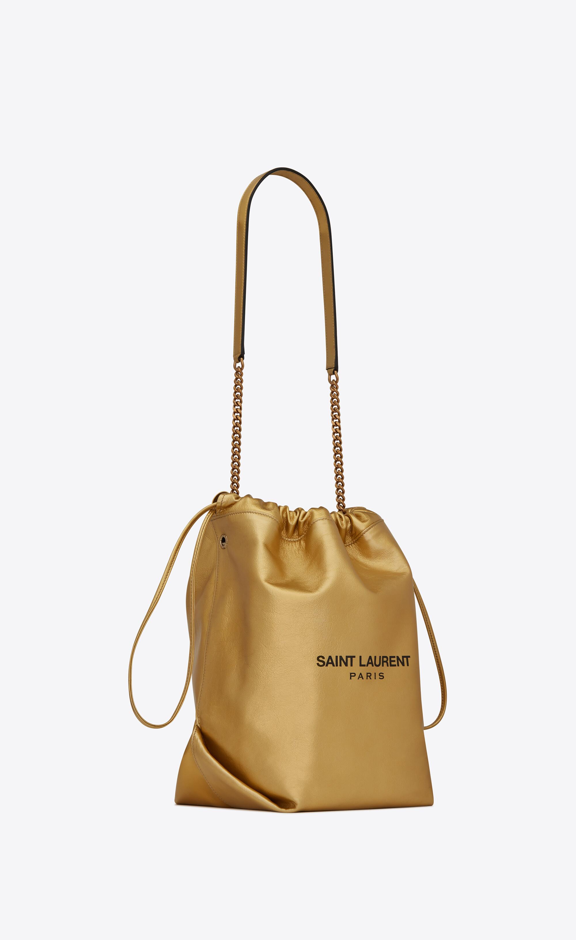 Saint Laurent Teddy Bucket Bag In Lame Look Leather In Pale Gold Metallic Lyst