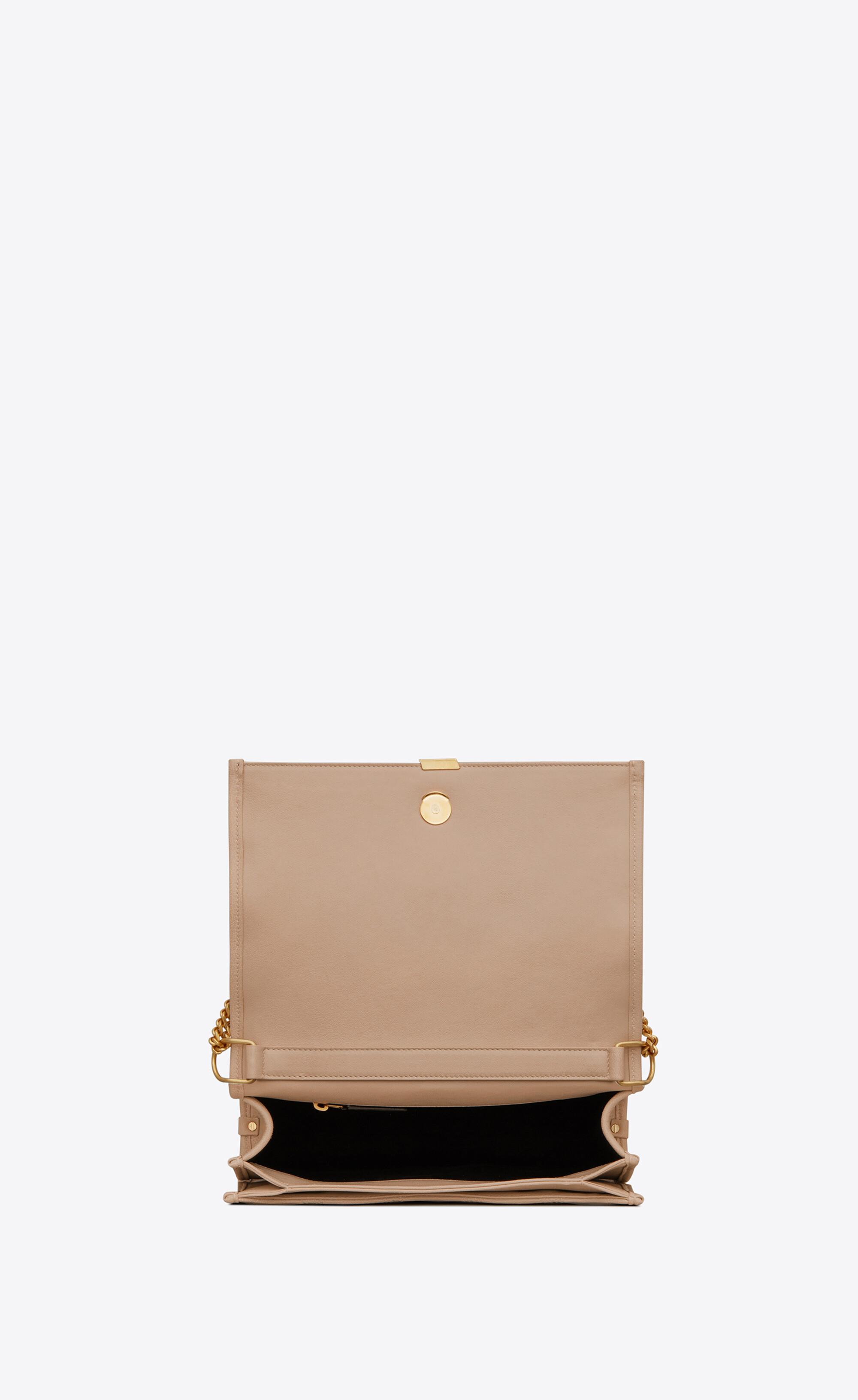 ysl becky bolsa review