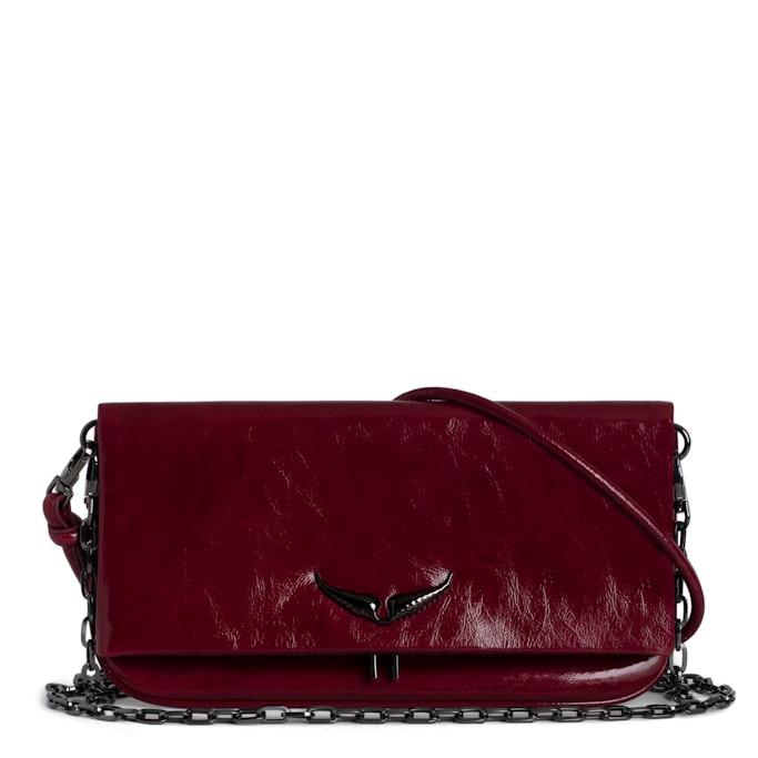 Rock suede patent clutch deals