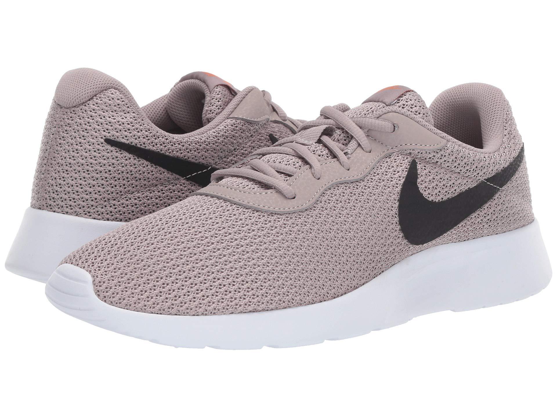 nike tanjun 8126
