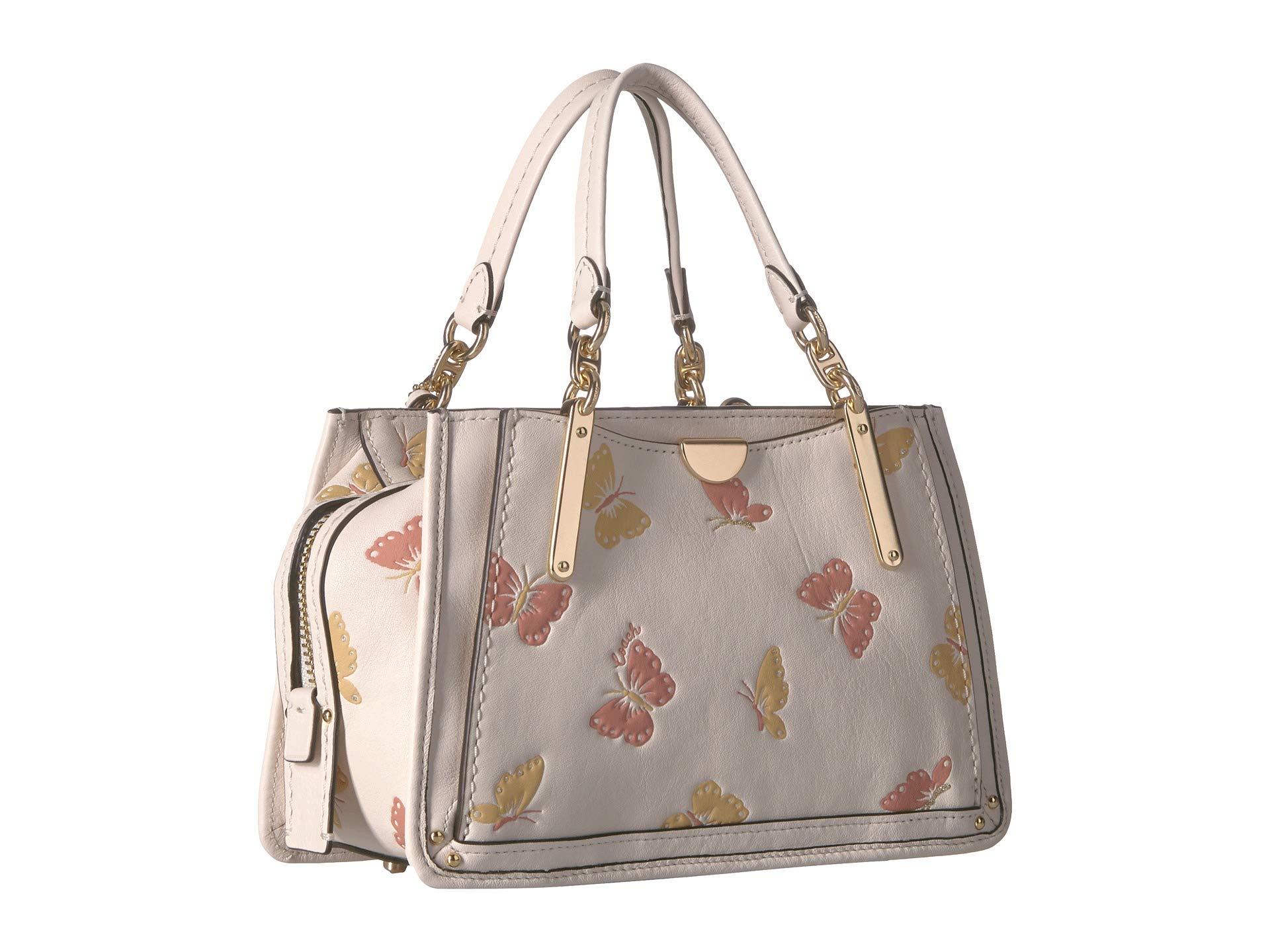 coach dreamer 21 butterfly