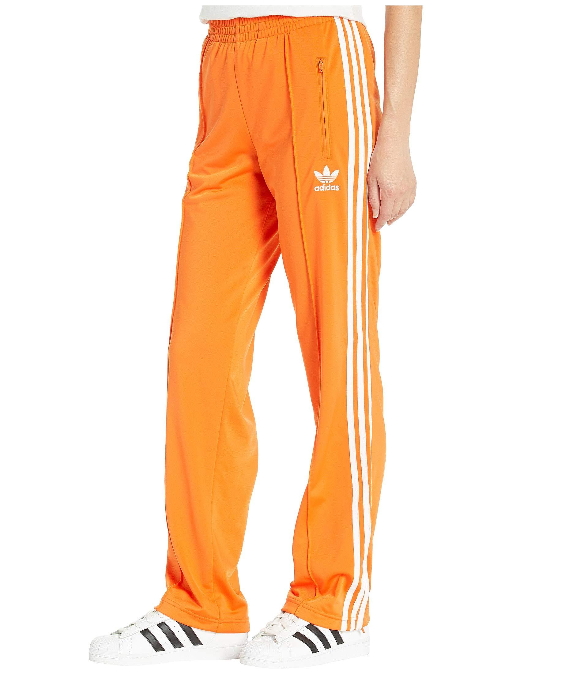 adidas Originals Firebird Track Pants in Orange | Lyst