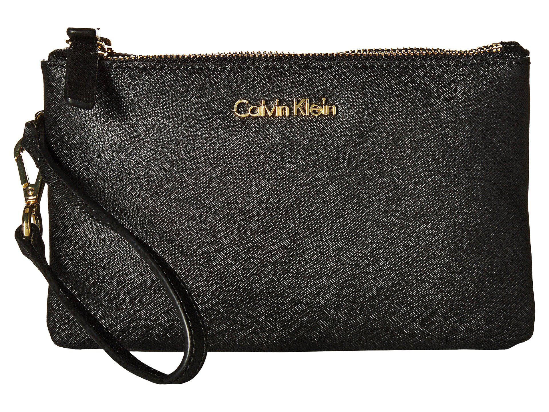 Lyst - Calvin Klein Saffiano Wristlet (black/gold) Wristlet Handbags in Black