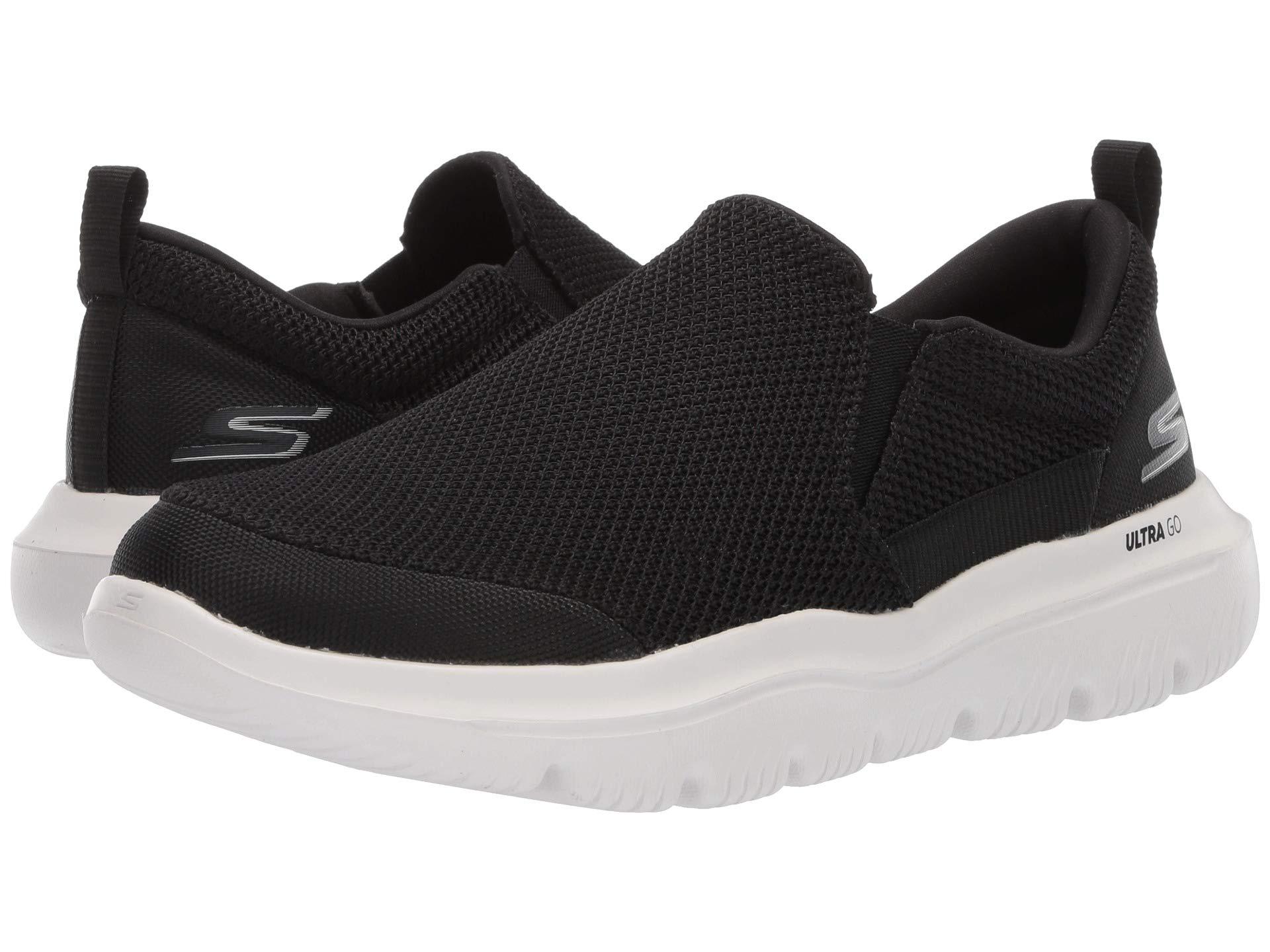 Skechers Synthetic Go Walk Evolution Ultra-impec Slip On Trainers in  Black/White (Black) for Men | Lyst