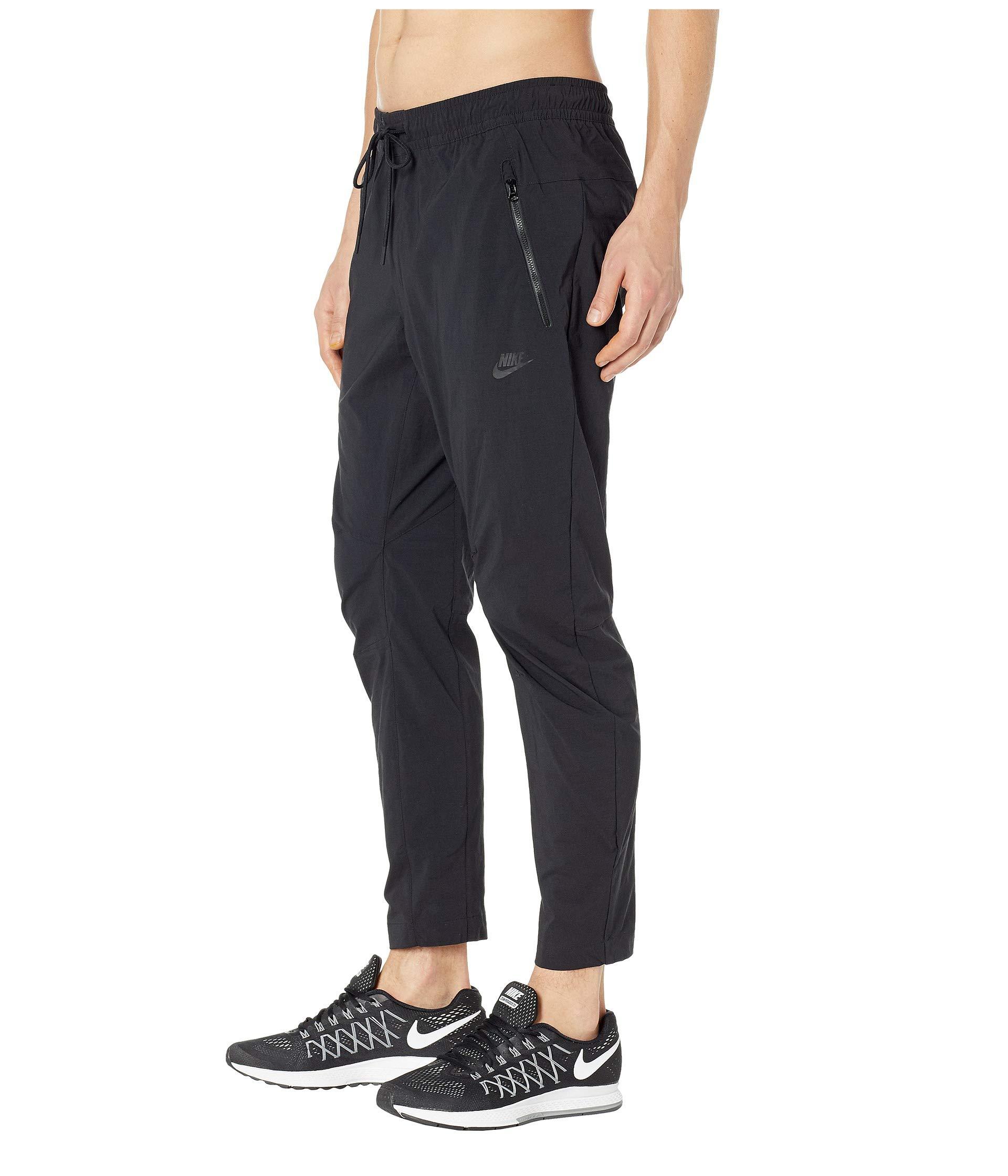 stock age Commerce Nike Synthetic Nsw Woven Statement Street Pants (black/black) Men's Casual  Pants for Men | Lyst