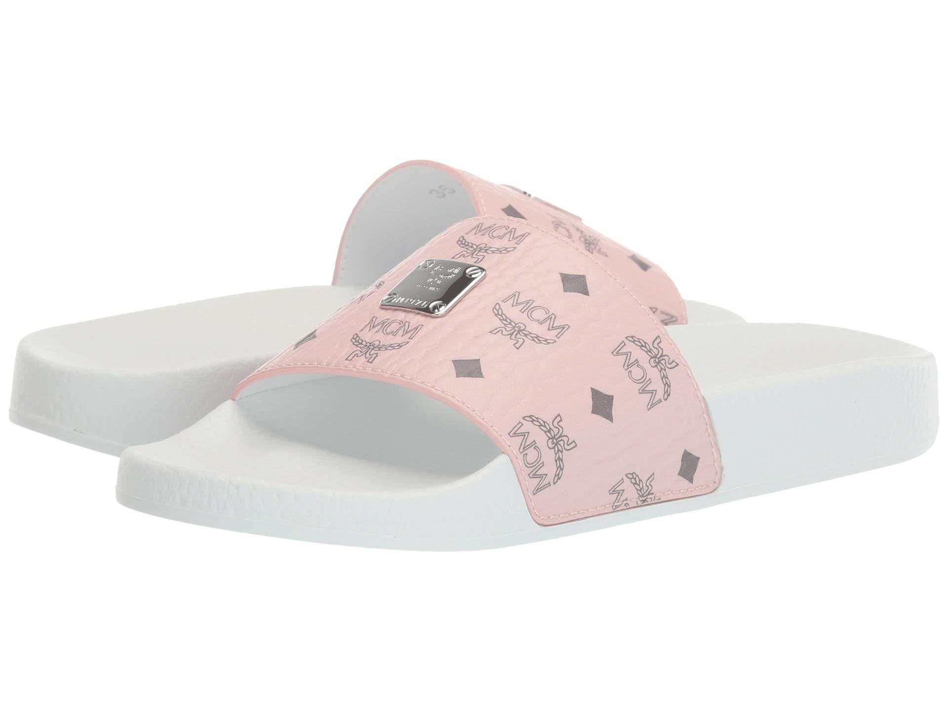 Mcm Pink Slides - White circle outlined in black with upwards pointing ...