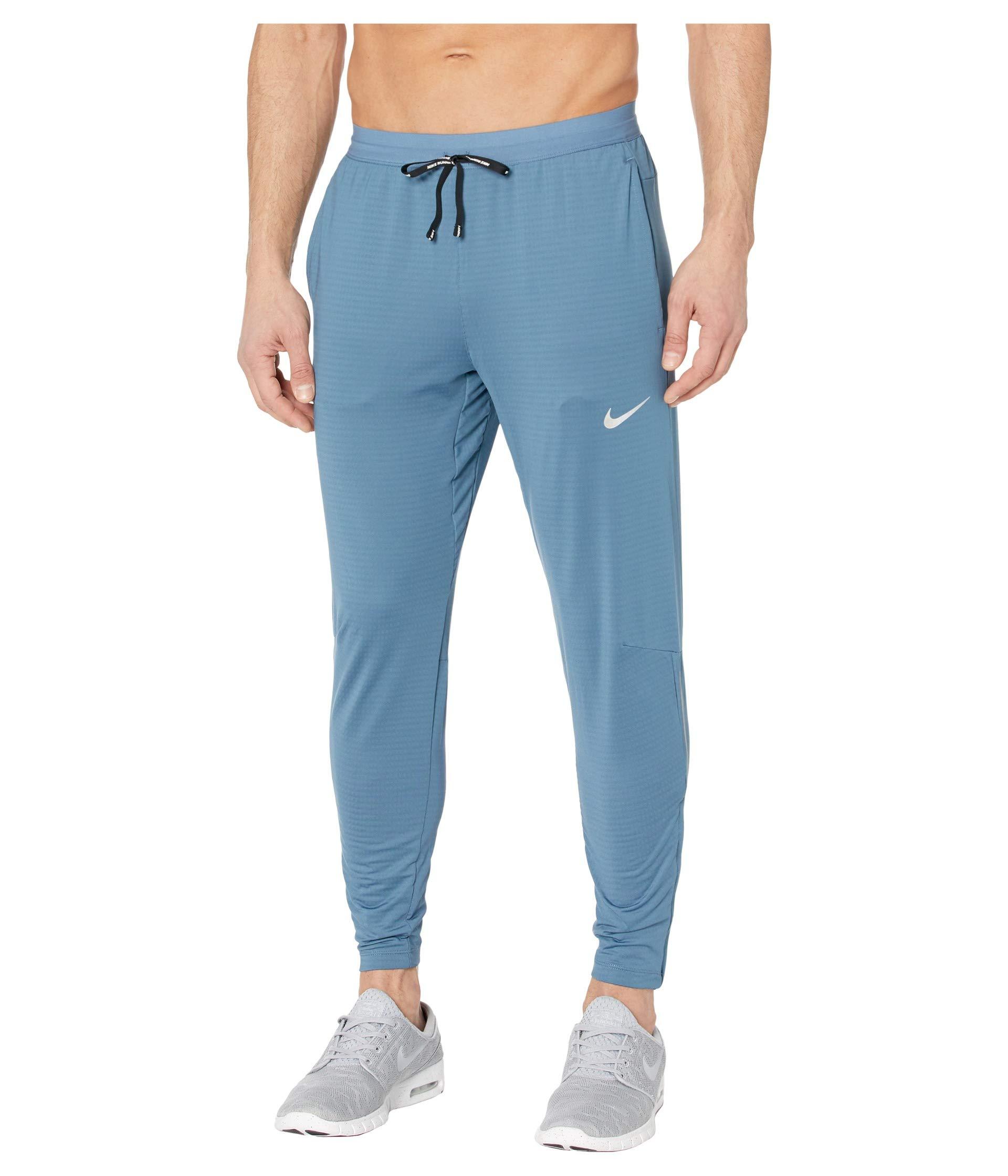 Joggers azules de tejido Phenom Elite de Nike Running, White