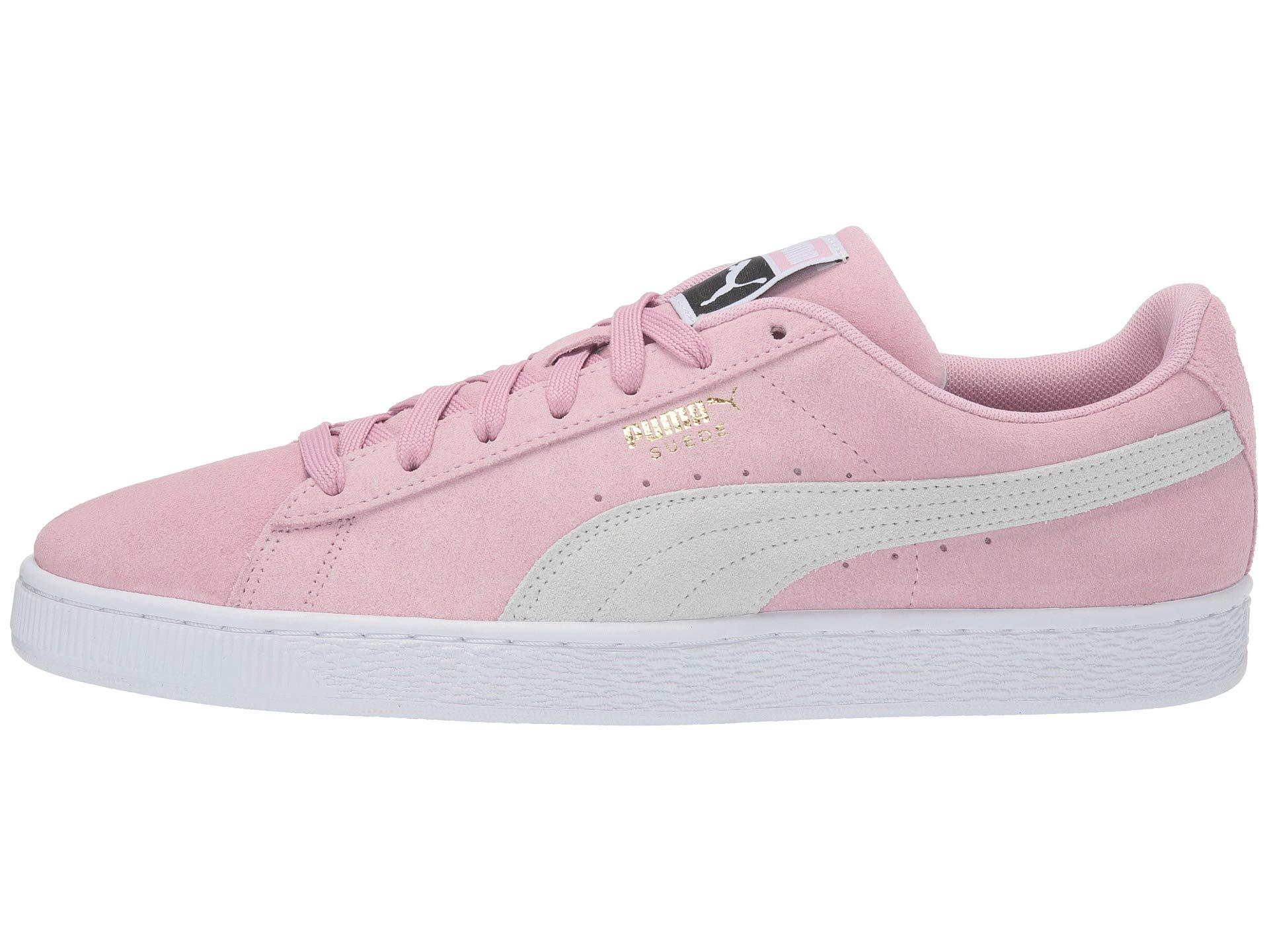 pink and white puma suedes