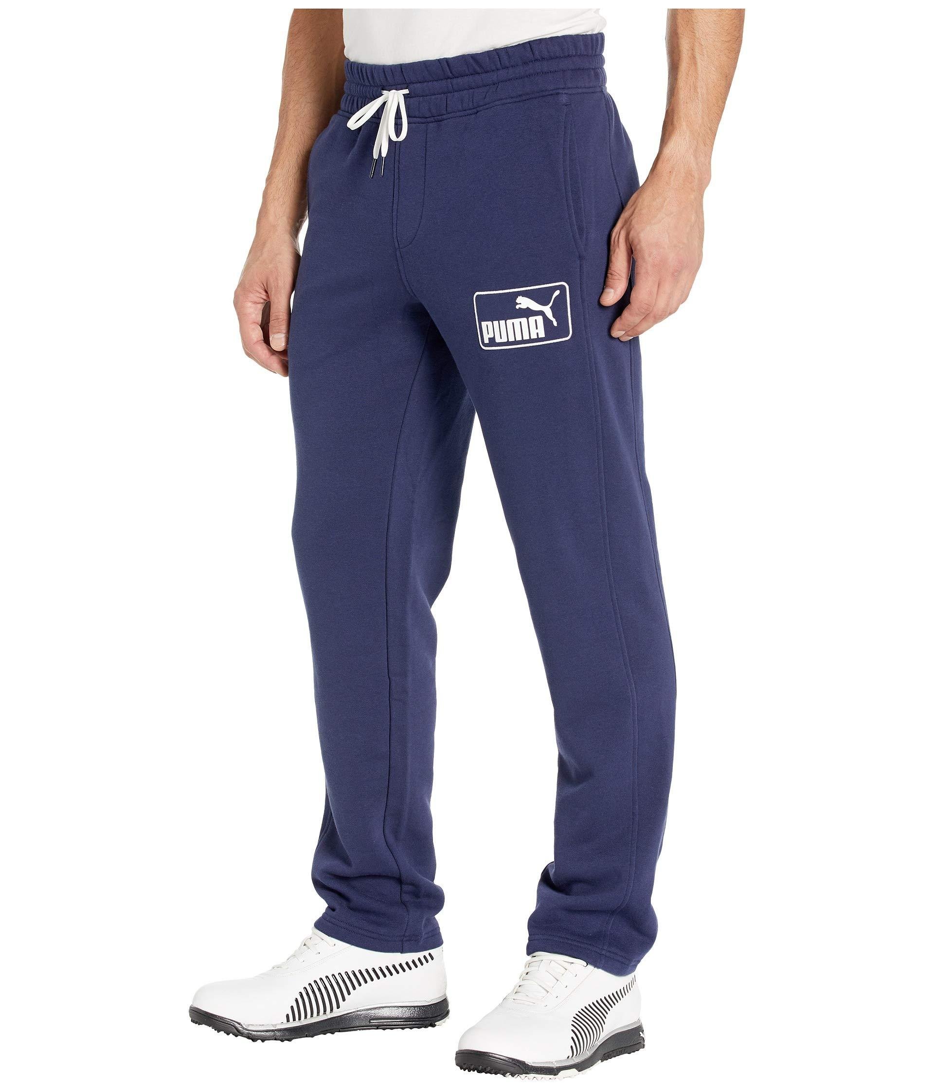 PUMA Cotton Logo Track Pants in Blue for Men - Lyst