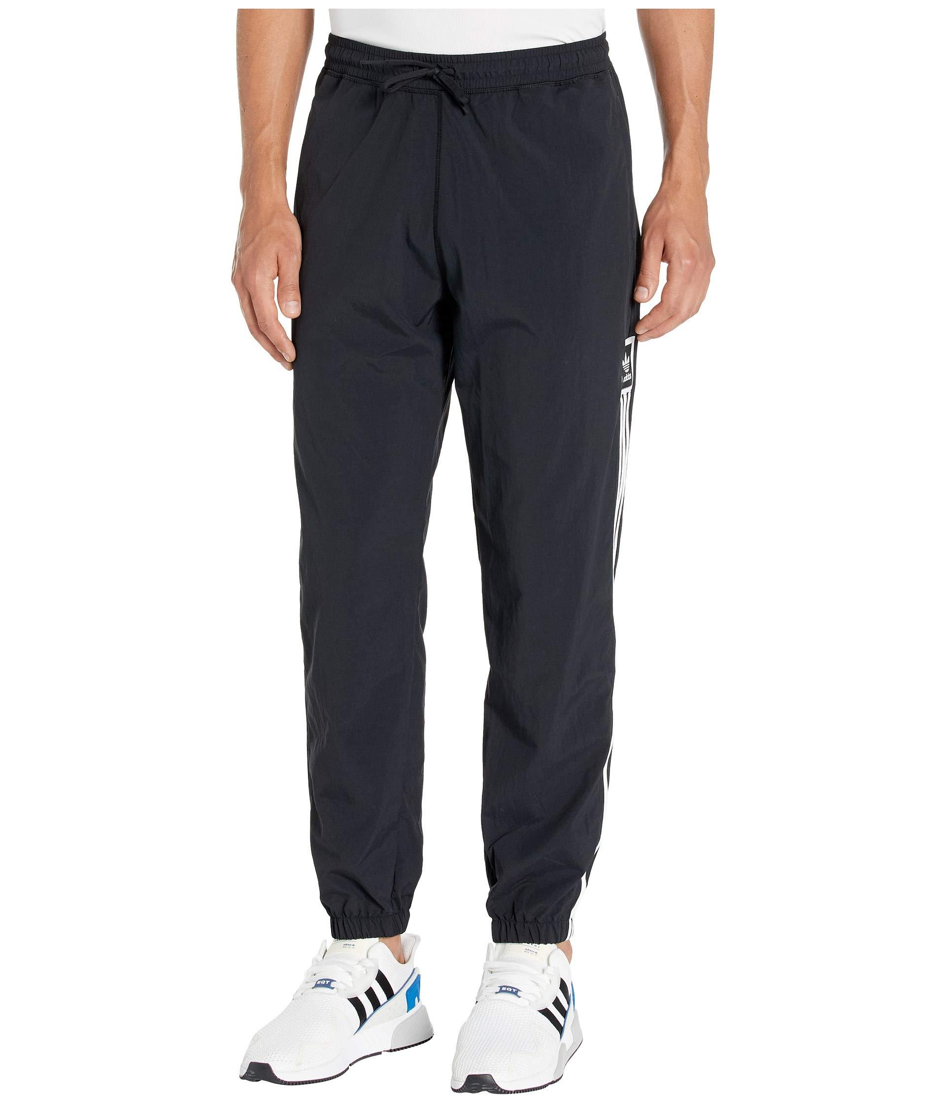 adidas Originals Synthetic Standard Wind Pants in Black for Men - Lyst
