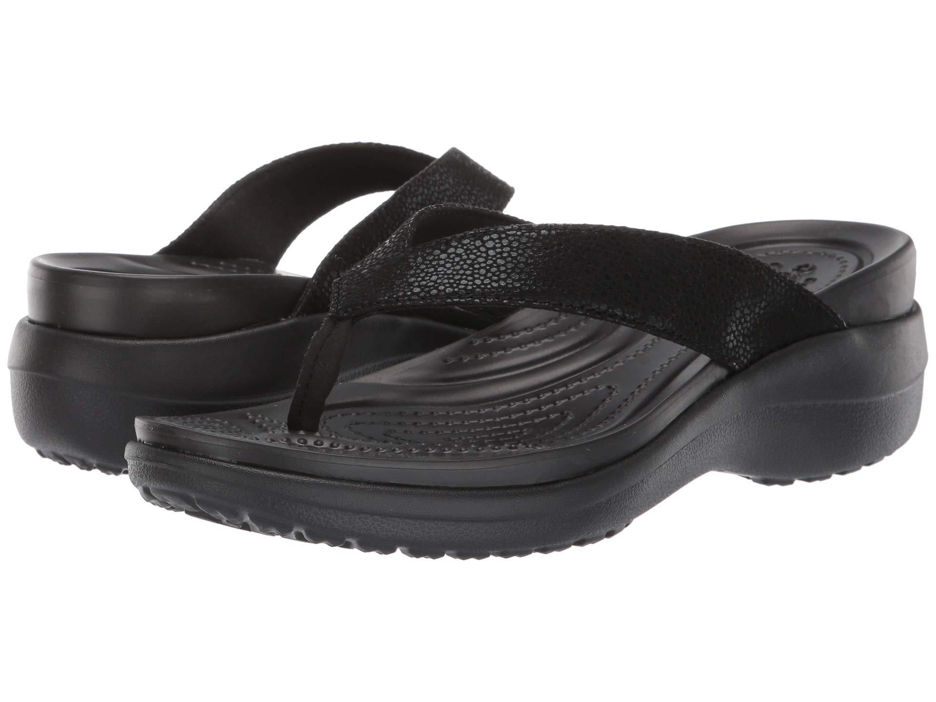 blue crocs with charms