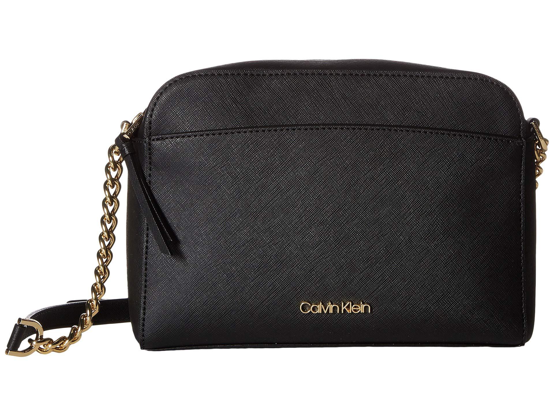 calvin klein black and gold purse