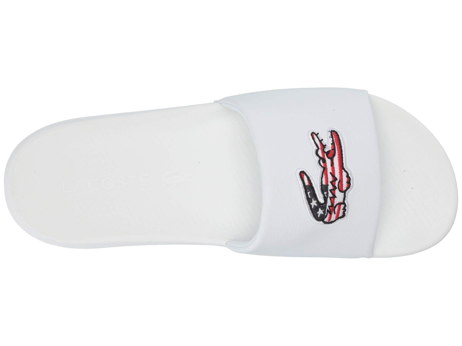 white lacoste slides