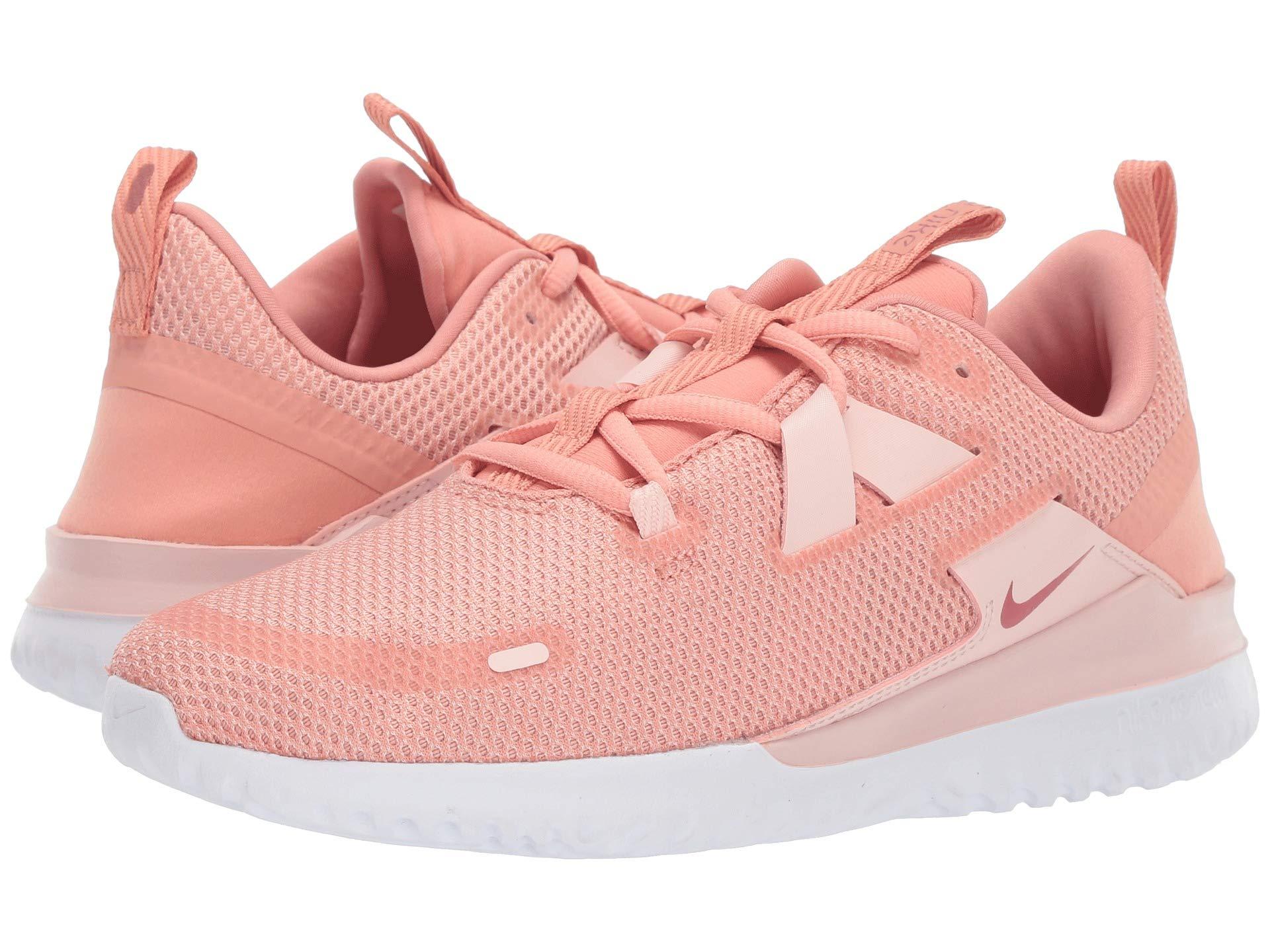 nike running renew arena sneakers in pink