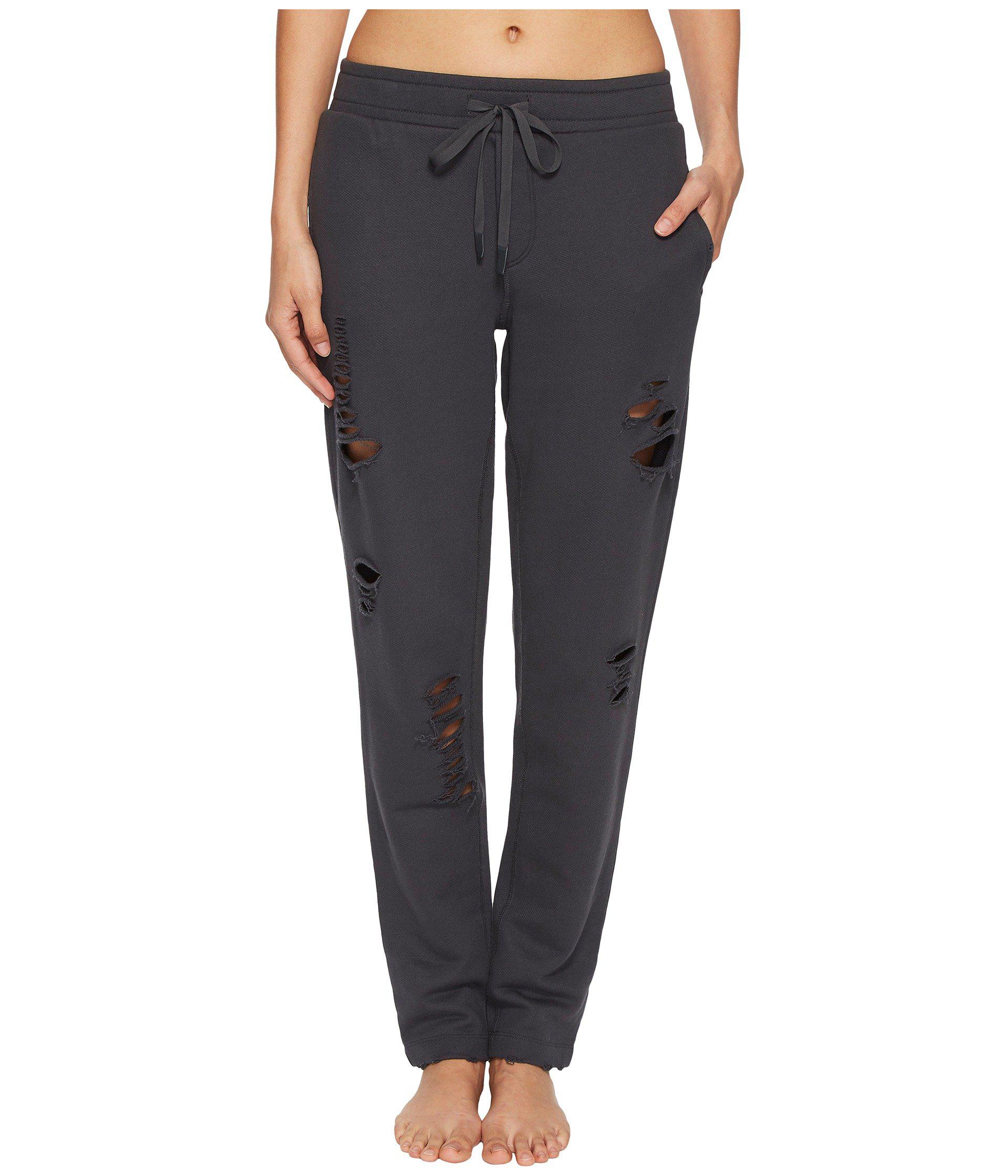 https://cdna.lystit.com/photos/zappos/4763c71c/alo-yoga-AnthraciteDistressed-Holes-Ripped-Sweatpants-anthracitedistressed-Holes-Womens-Casual-Pants.jpeg