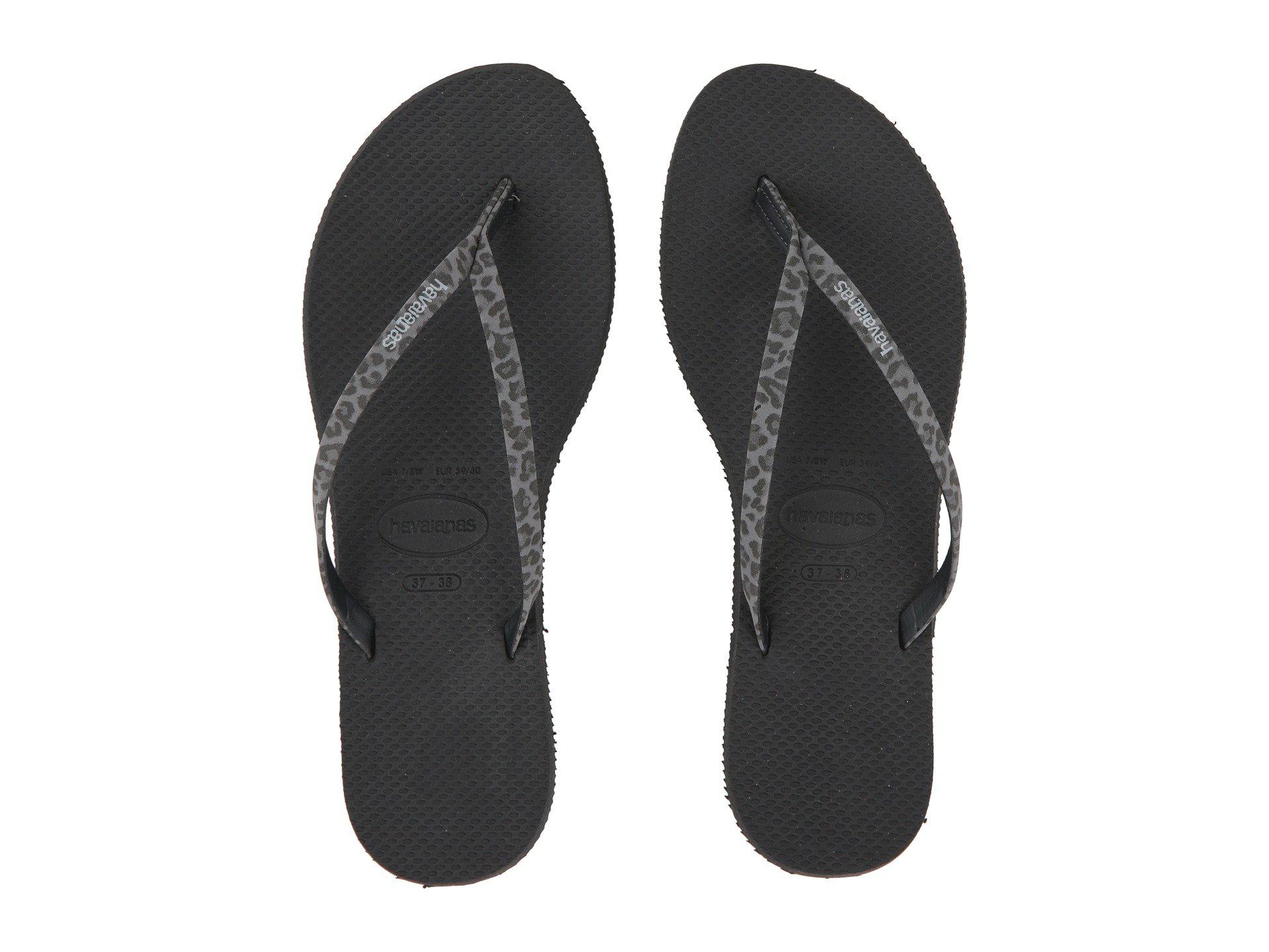 black animal flip flops