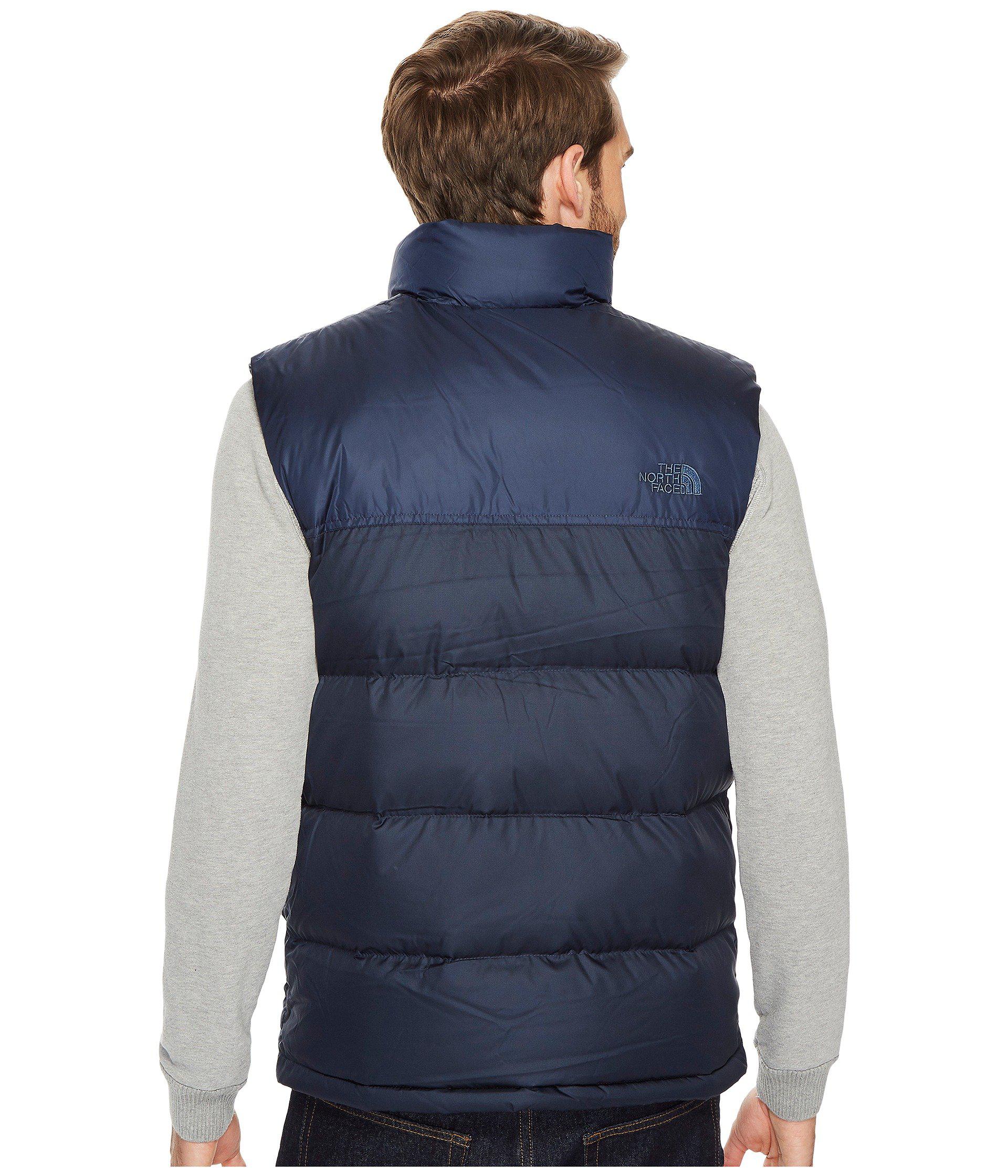 blue north face vest