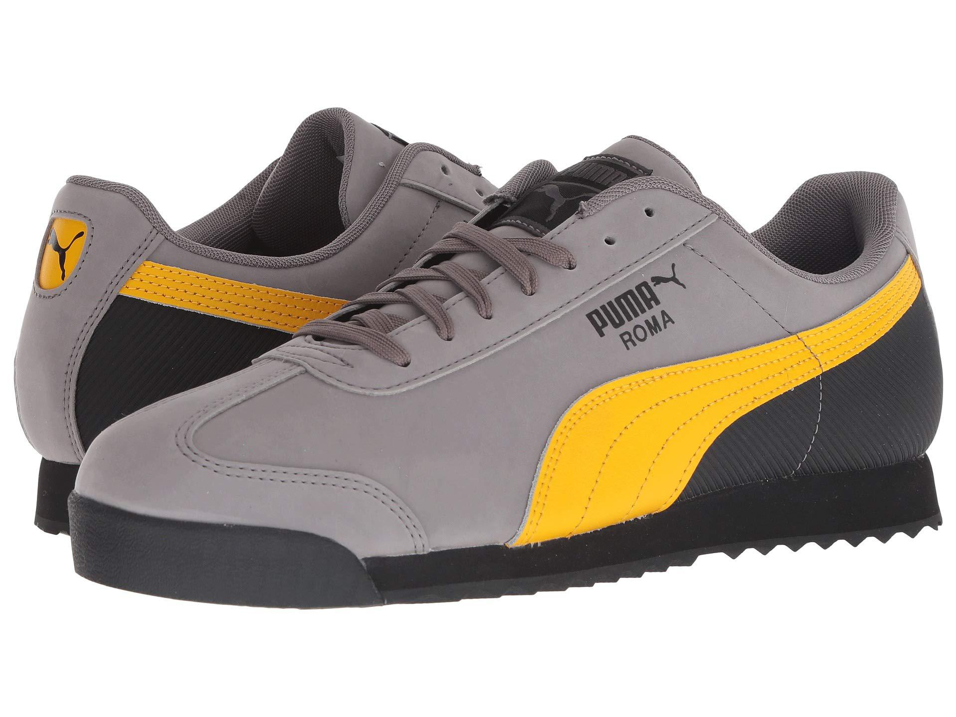 black and gray pumas