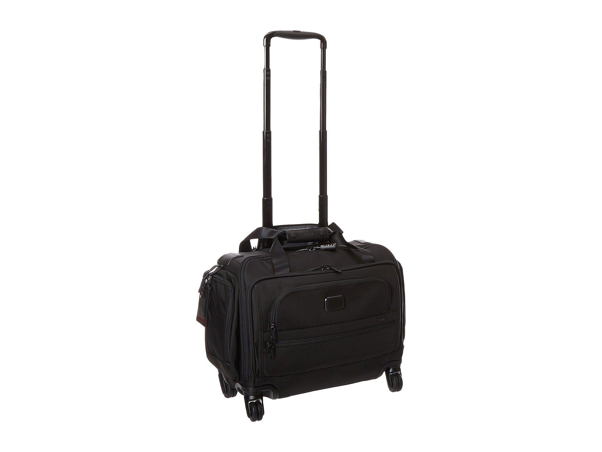 tumi 4 wheeled compact duffel