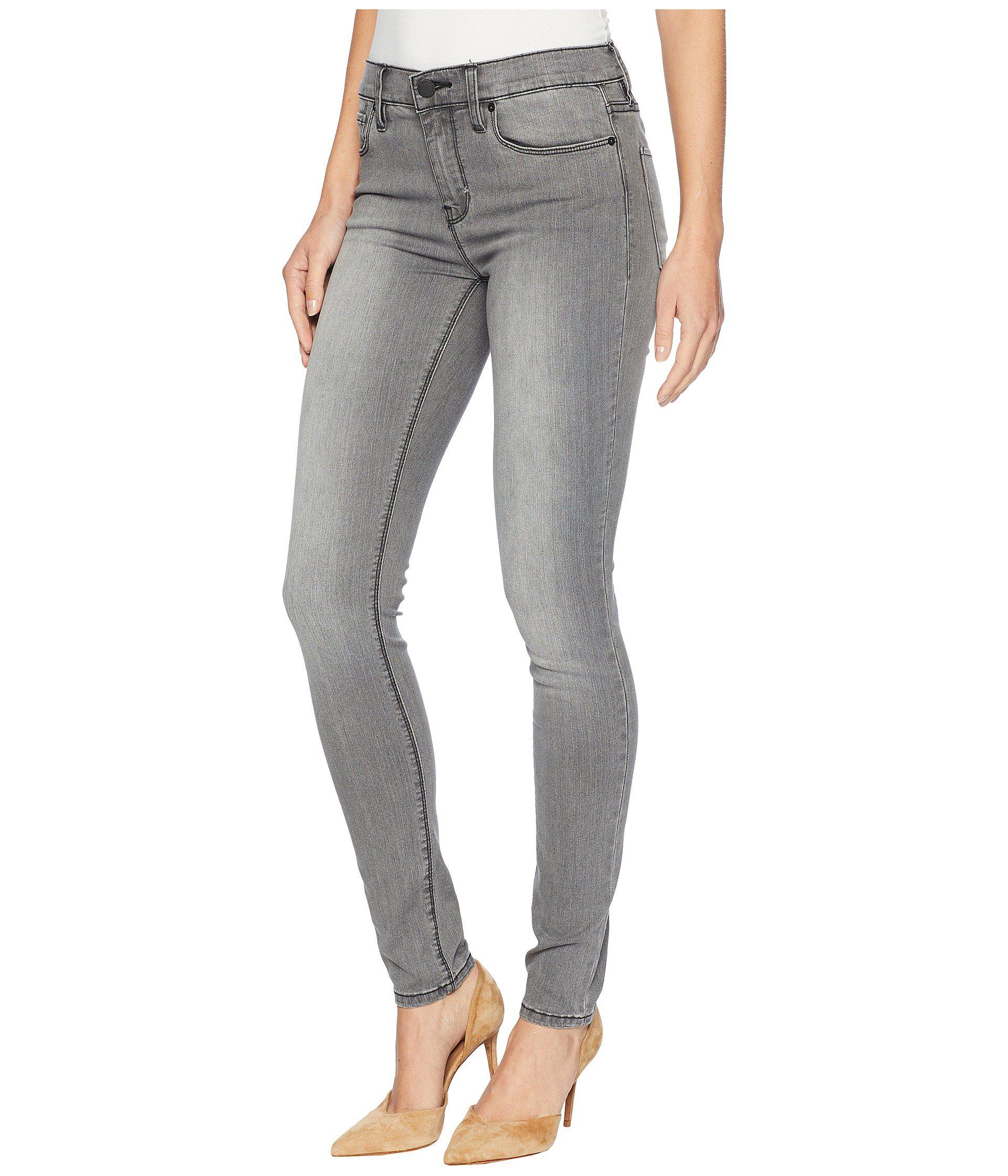 grey mid rise skinny jeans