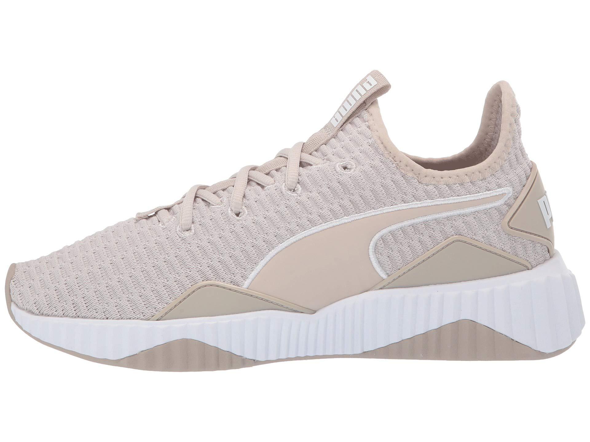 puma defy white pale pink