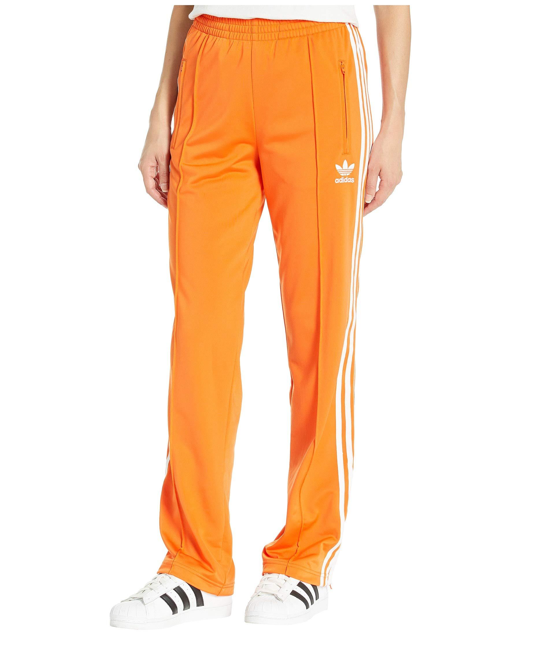 adidas Originals Firebird Track Pants in Orange | Lyst