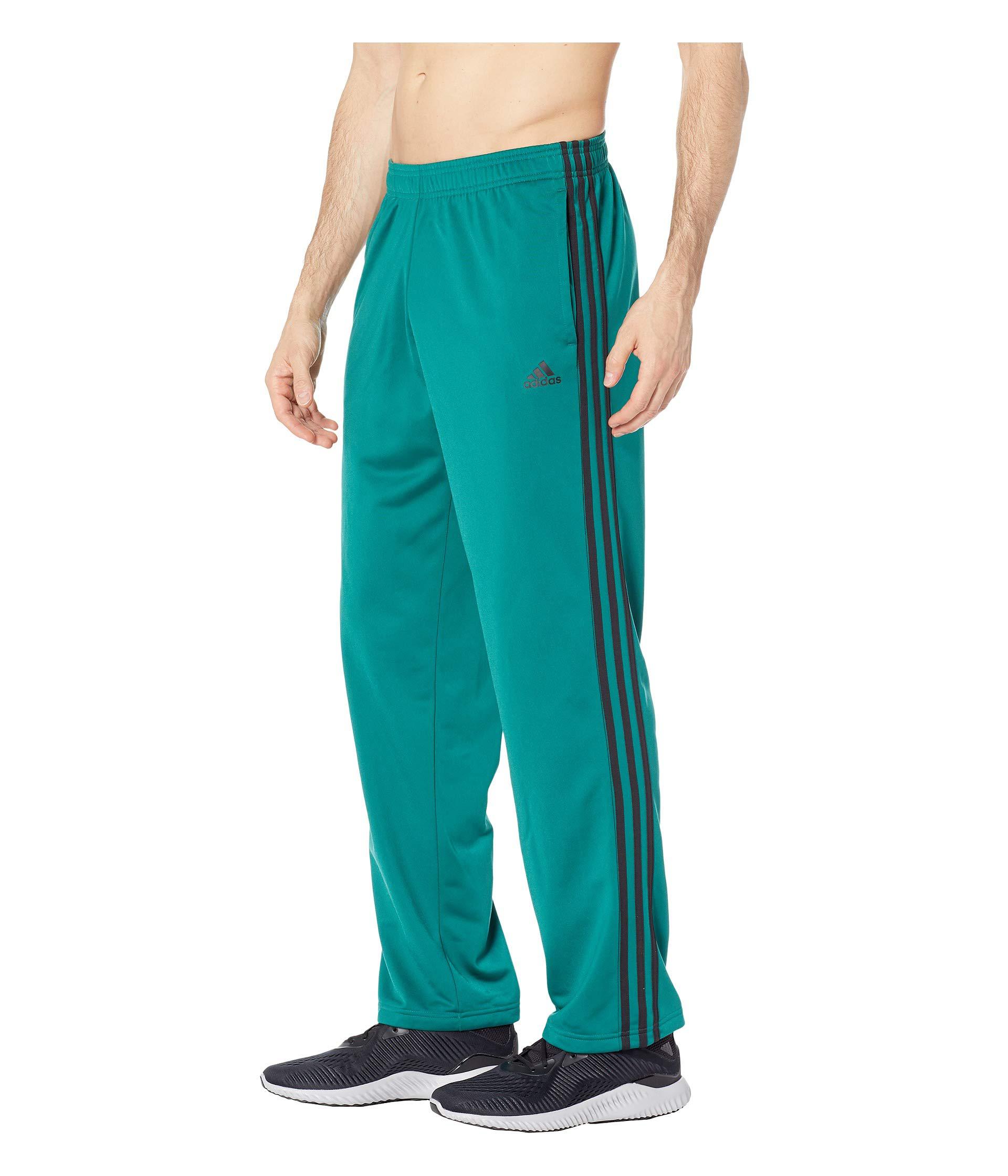 black and green adidas pants