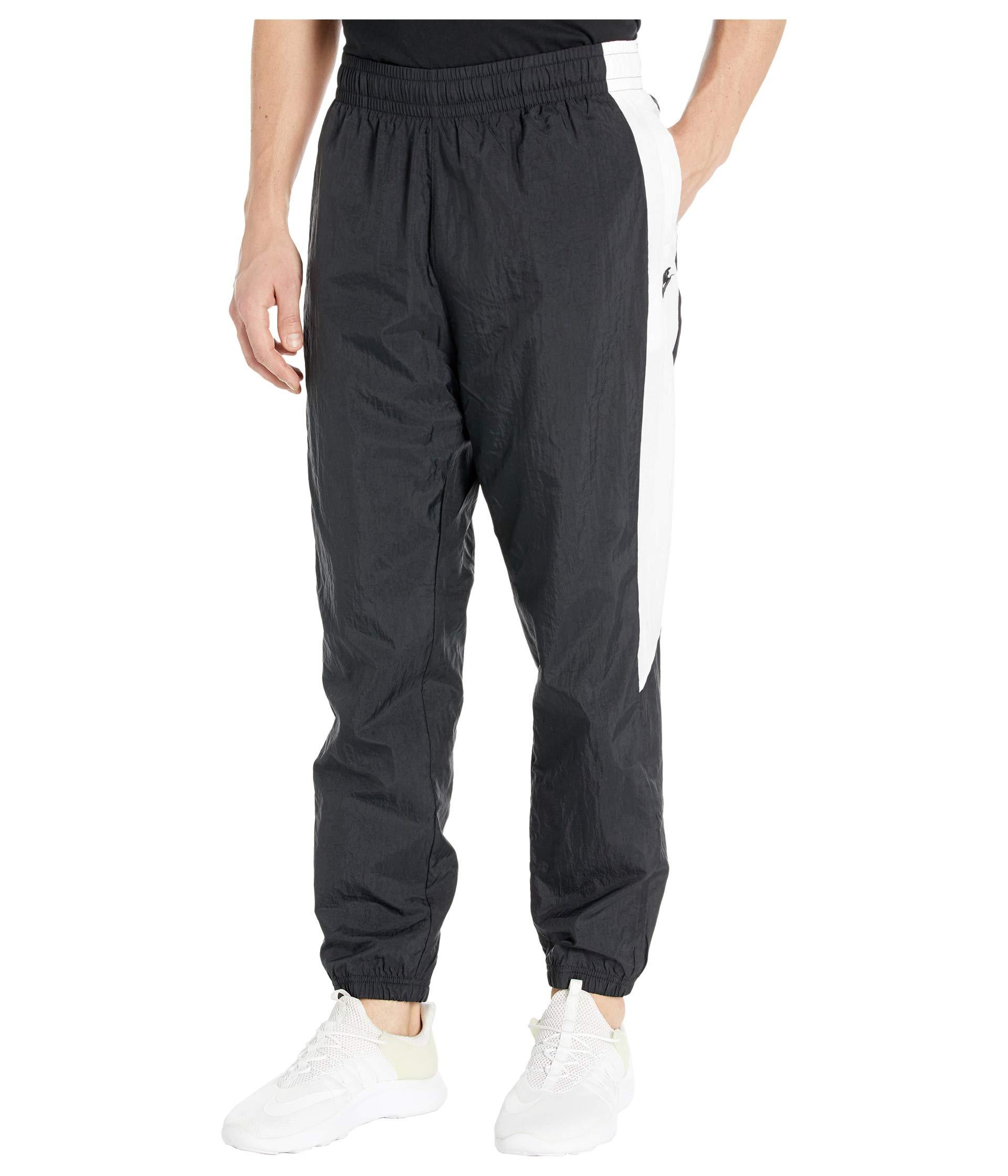 nike woven cuffed joggers