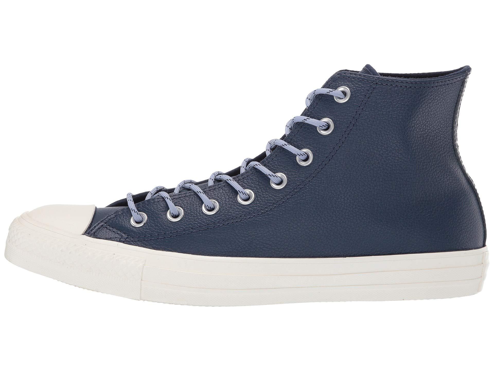 navy leather converse