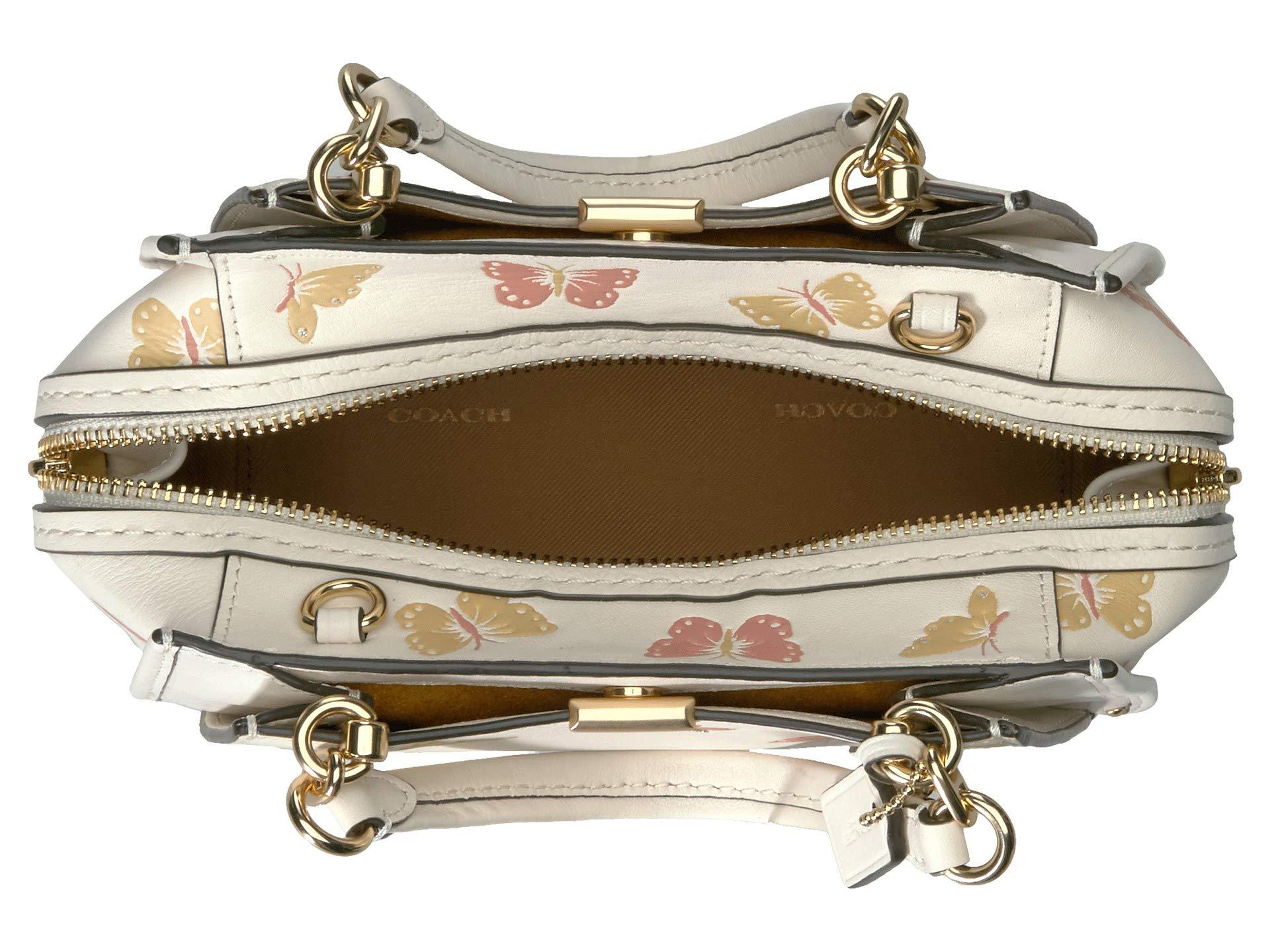 coach dreamer 21 butterfly