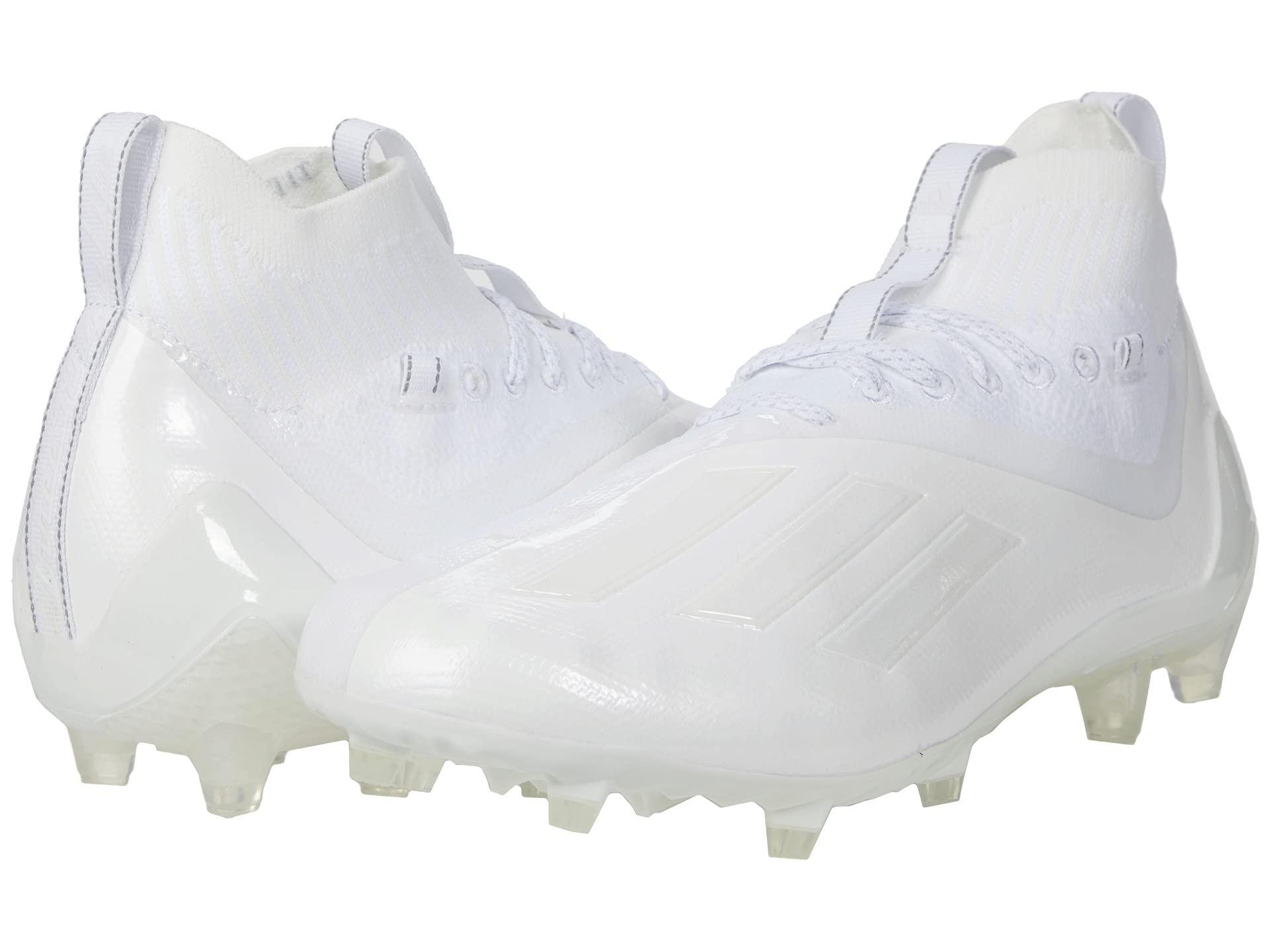 white adidas cleats