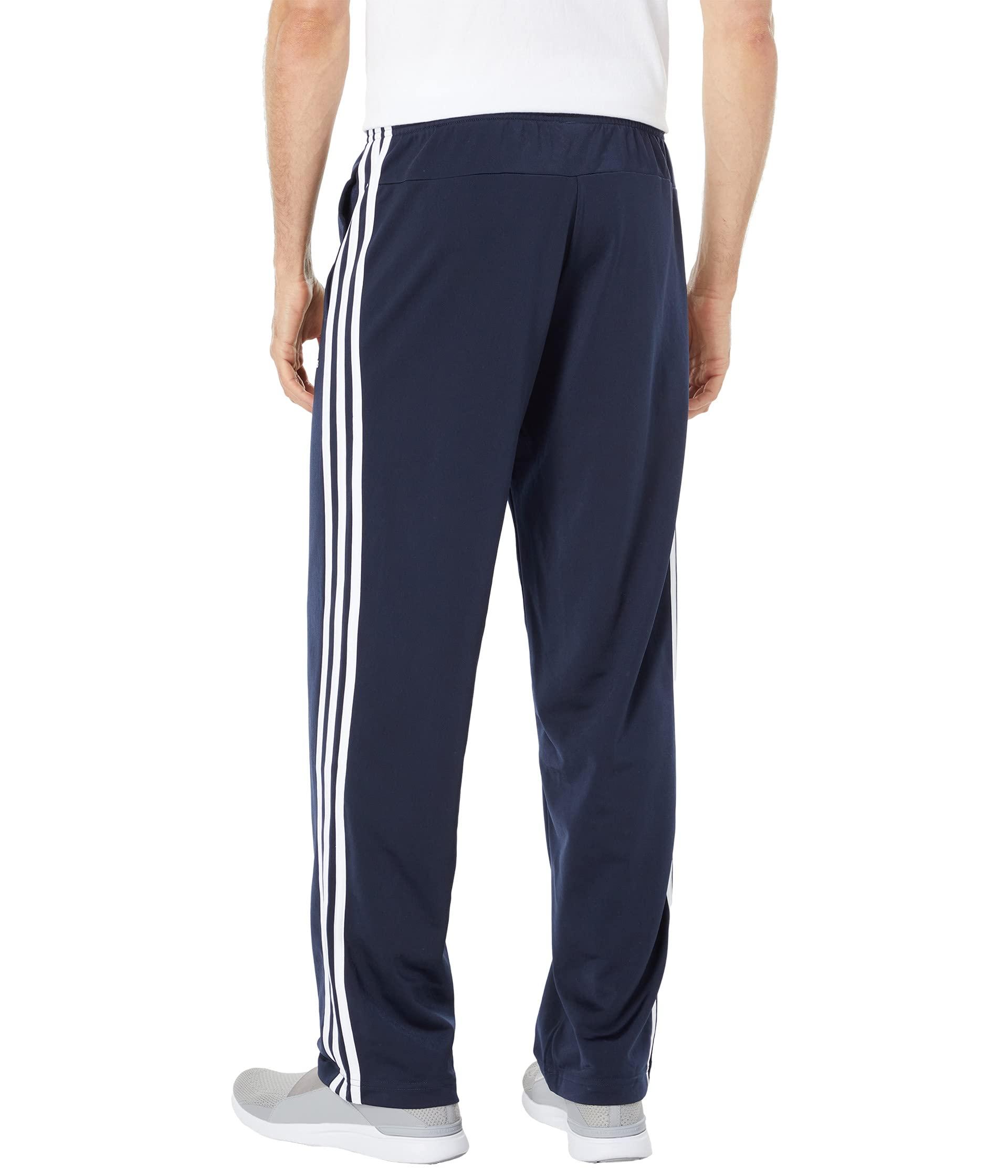 white adidas pants with blue stripes