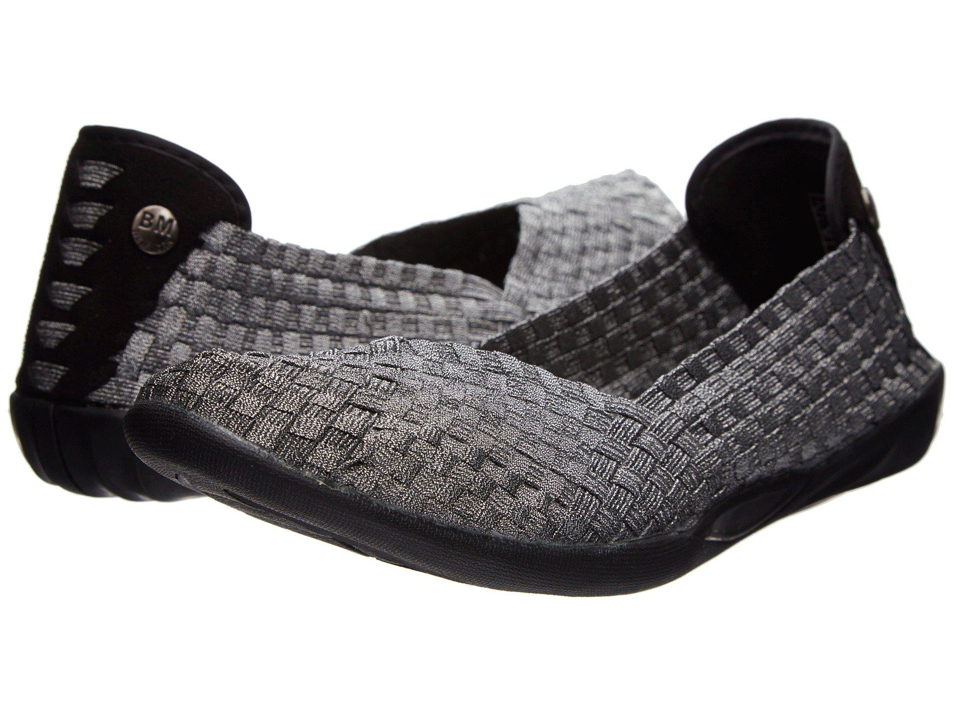 black and grey slip ons