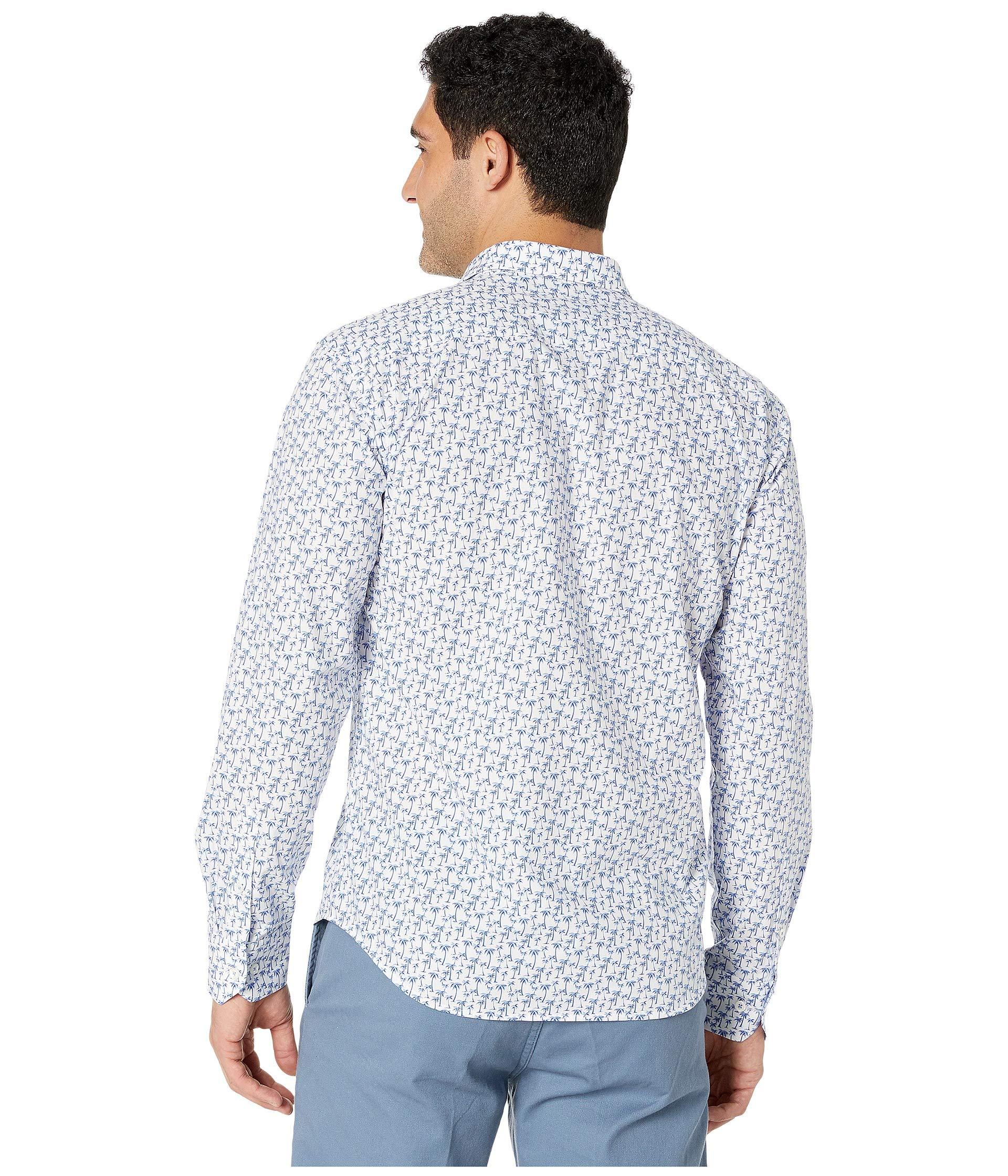 blue shirt with palm trees