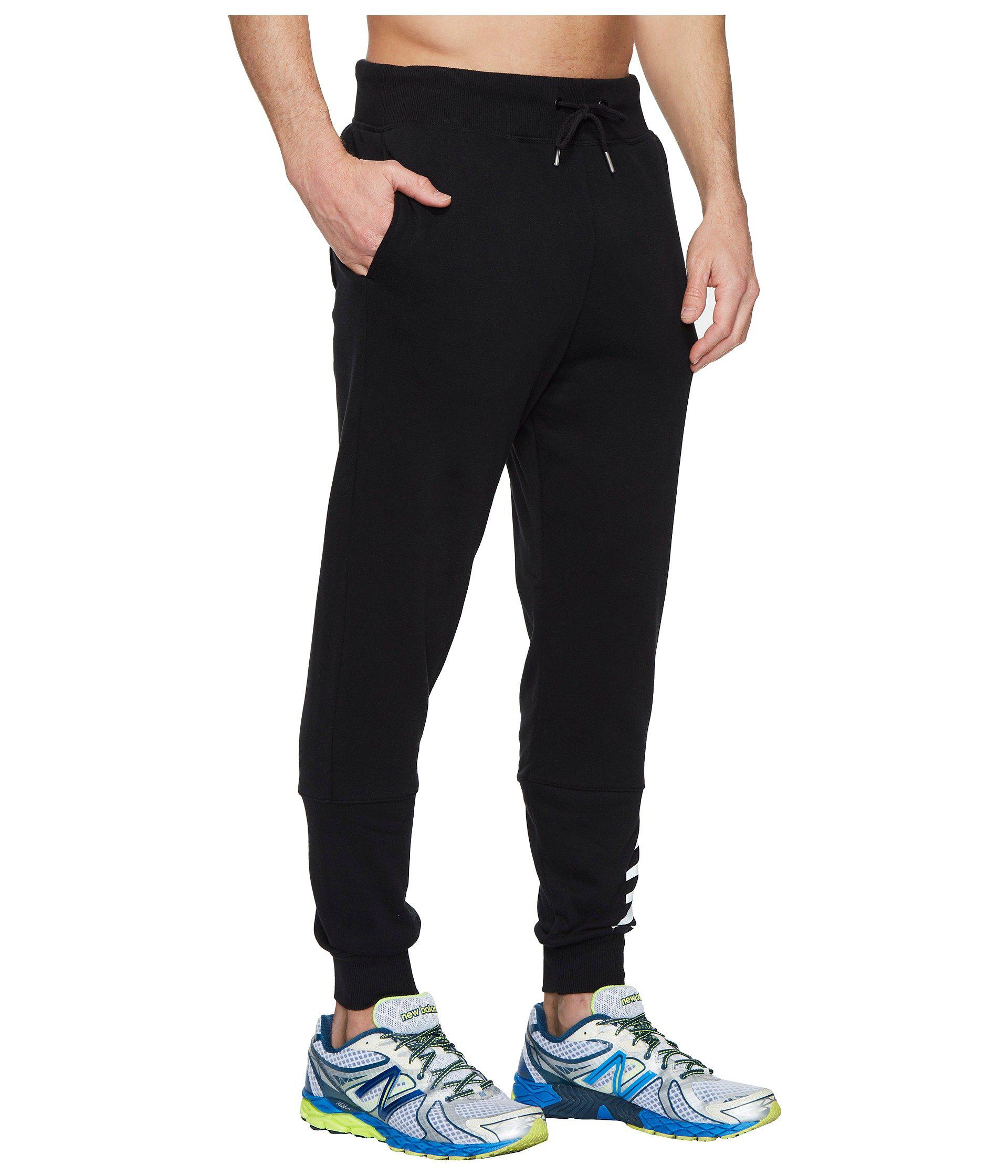 New Balance Cotton Essentials Ft Graphic Sweatpants in Black for Men - Lyst