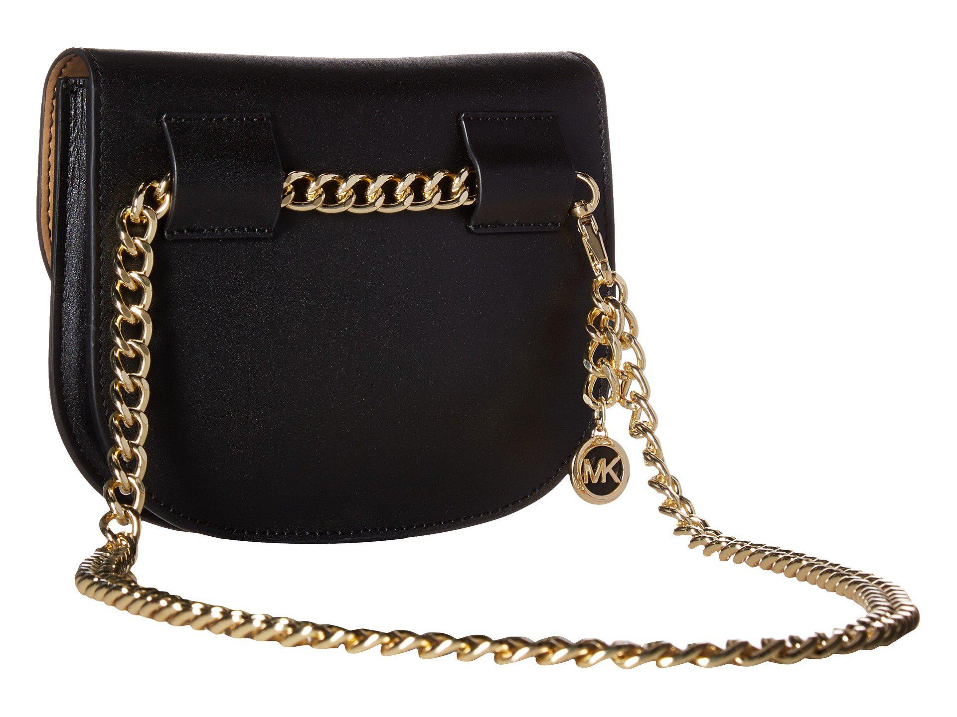 Total 73+ imagen michael kors black handbag with gold chain - Abzlocal.mx