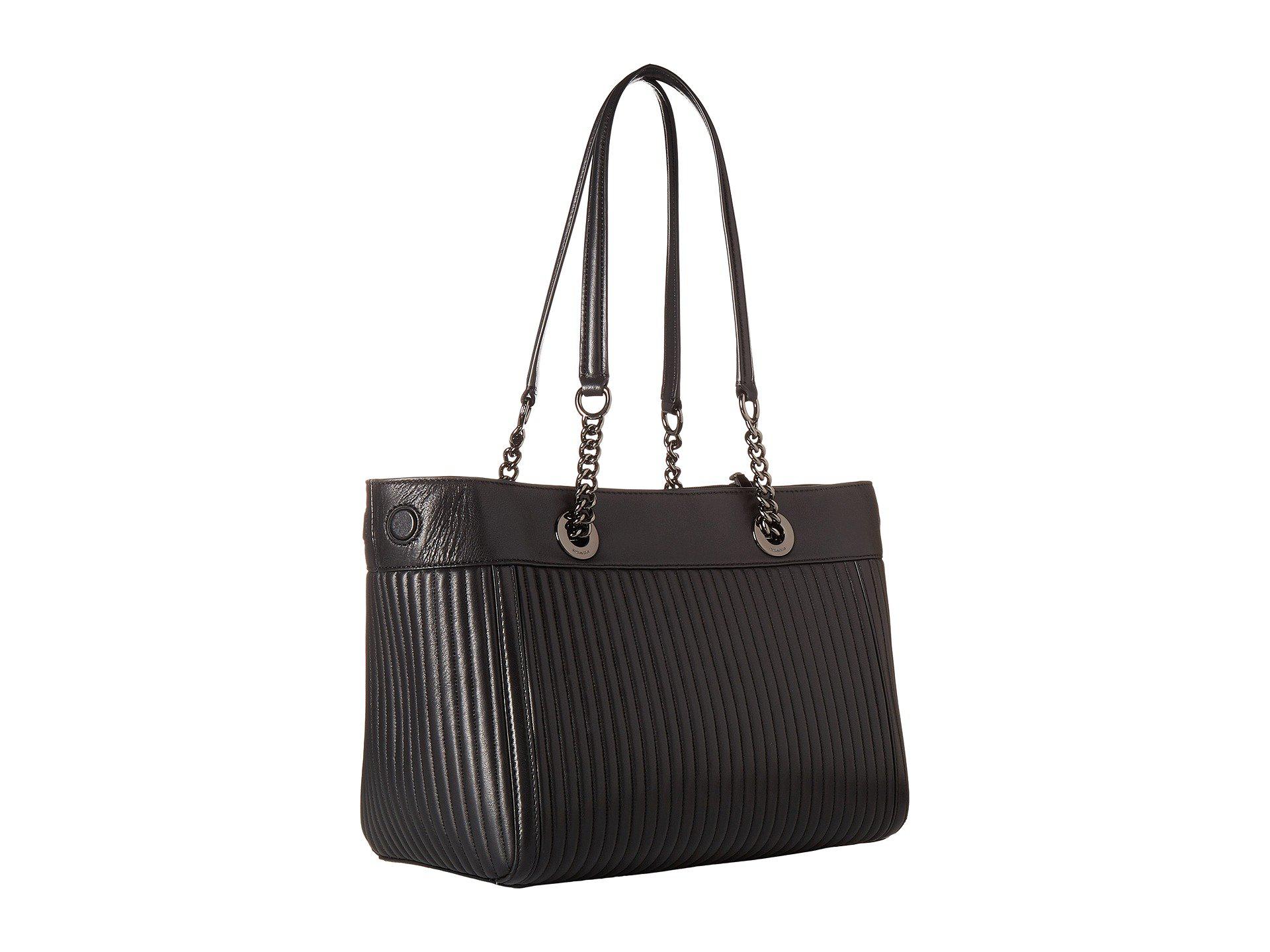 coach turnlock edie carryall