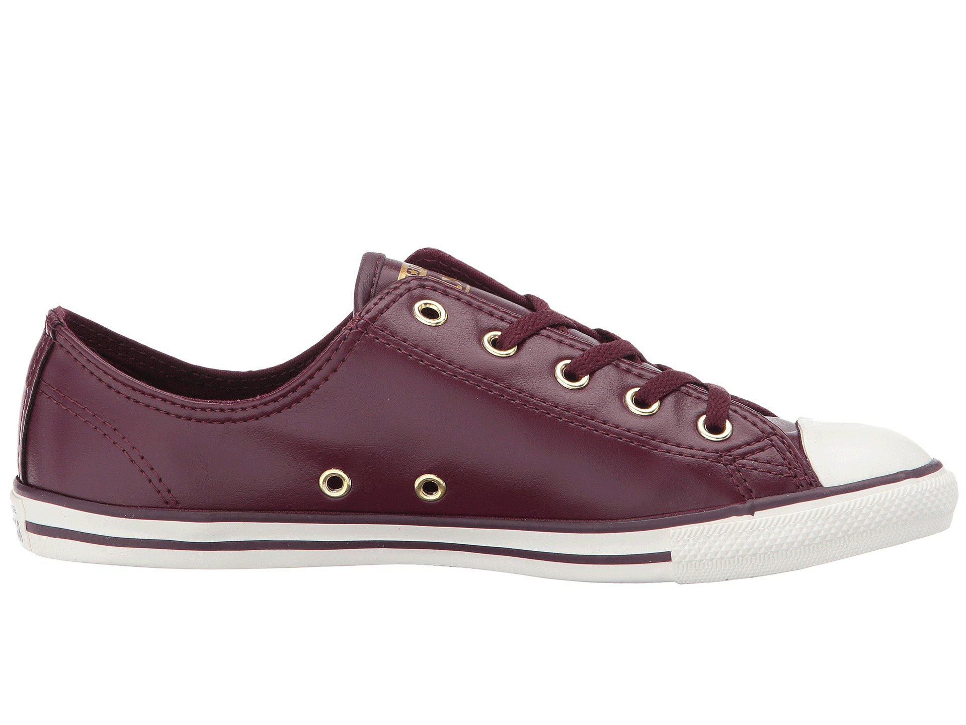 black sneakers with gum soles