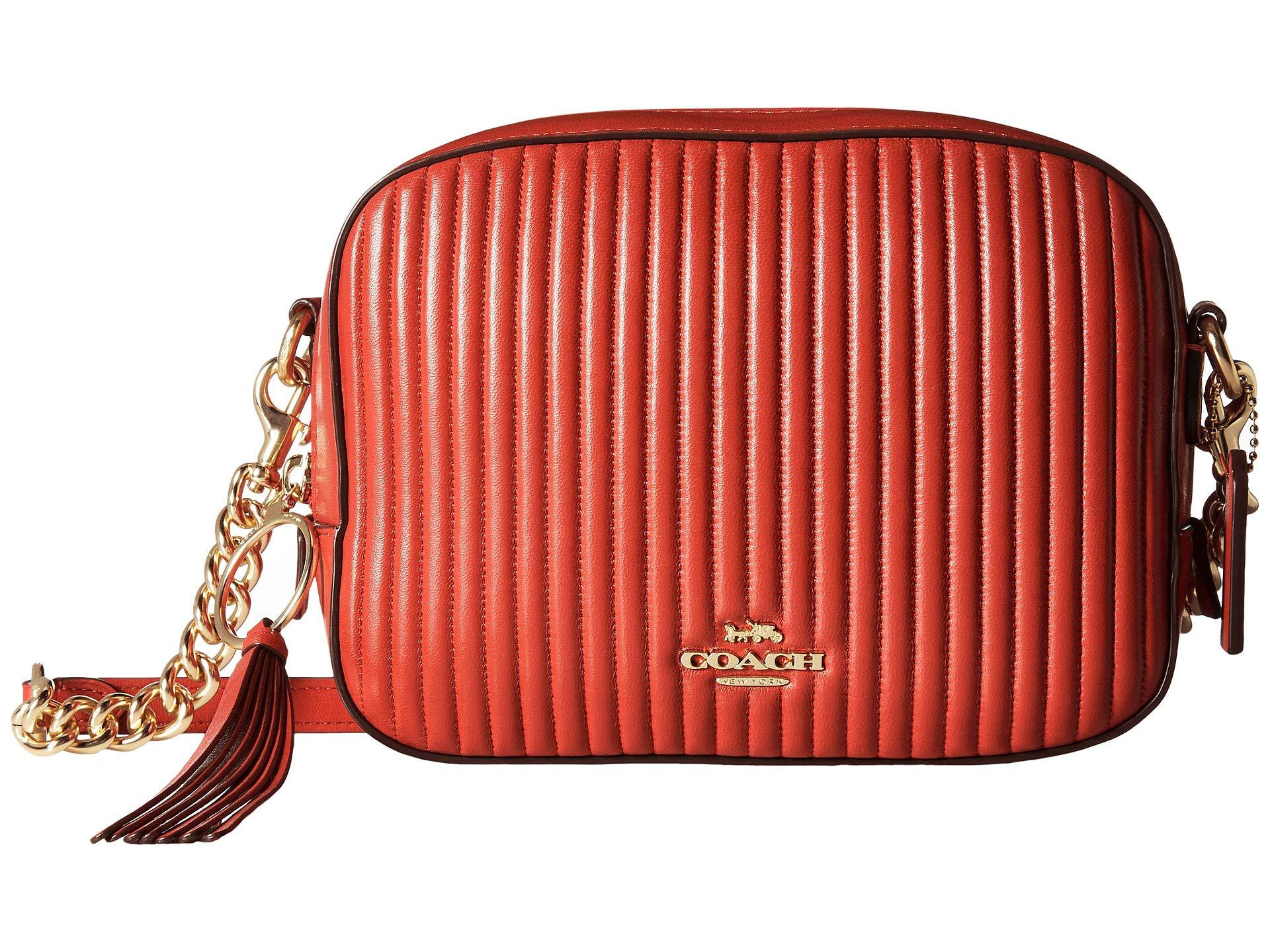 coach red quilted camera bag