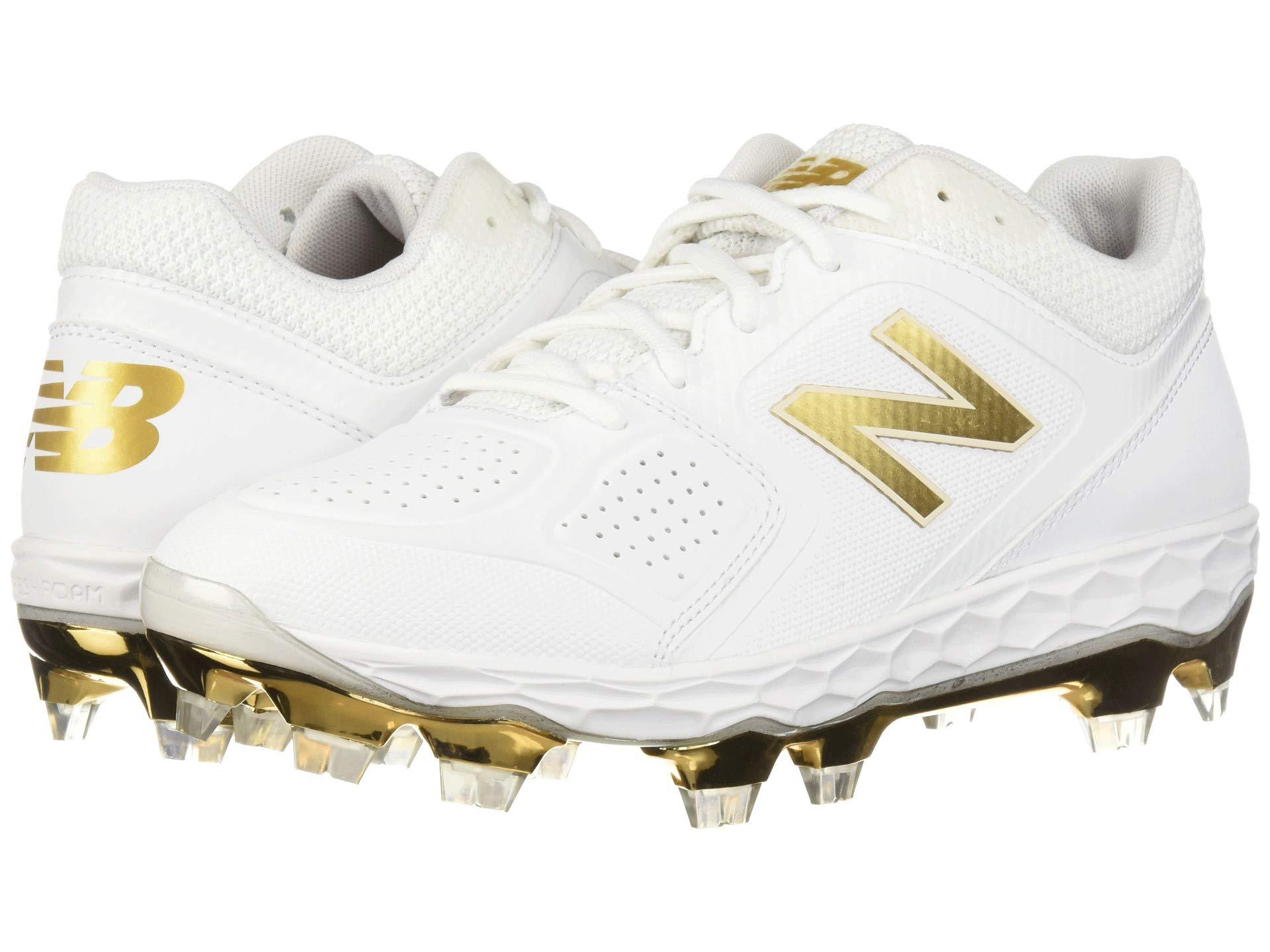 new balance gold and white