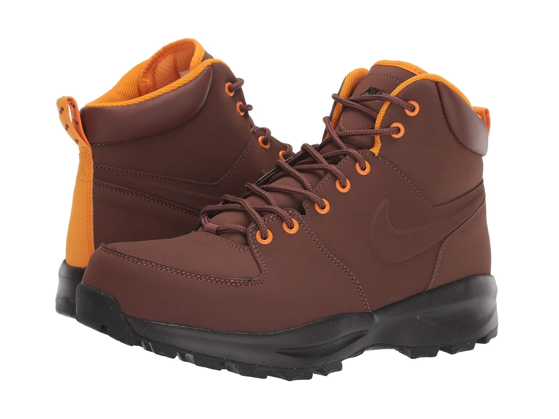 black nikes with brown sole