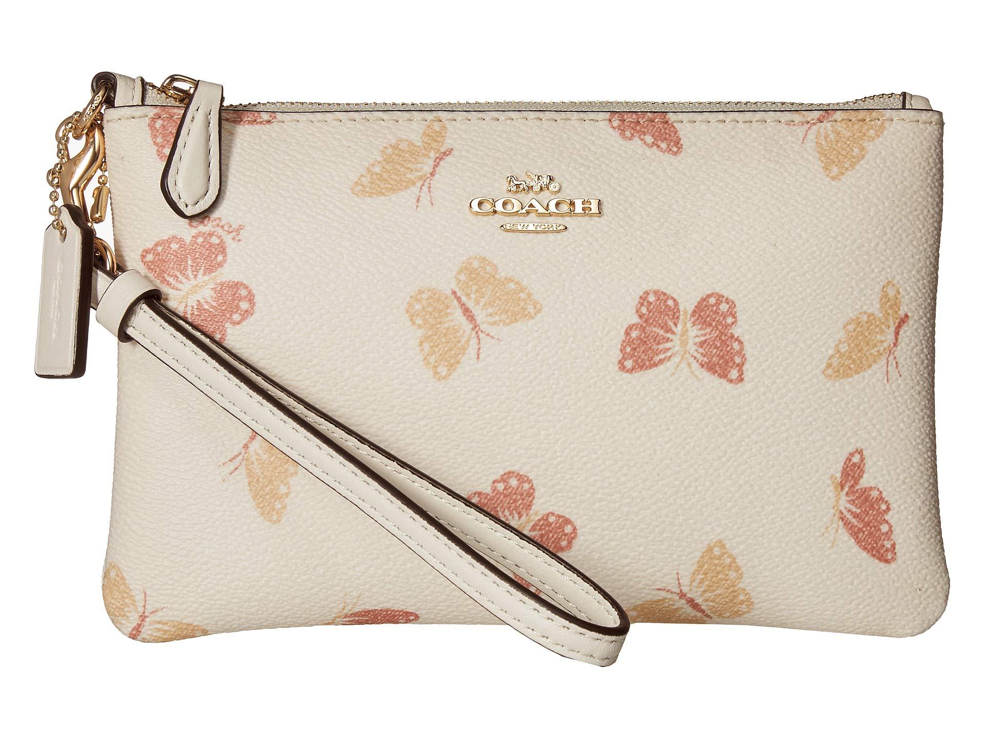 coach handbolsa with butterflies